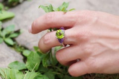 Peridot and amethyst trilogy ring in 18 karat gold
