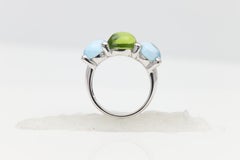 Peridot and blue topaz Ring cabochon shape 14 karat