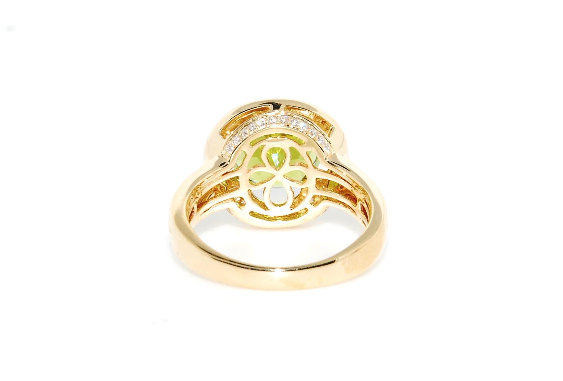 Round Cut Peridot and Diamond Cocktail Ring in 14 Karat Yellow Gold For Sale