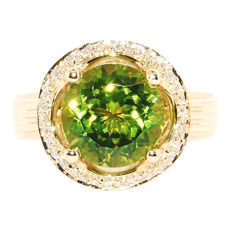 Peridot and Diamond Cocktail Ring in 14 Karat Yellow Gold For Sale