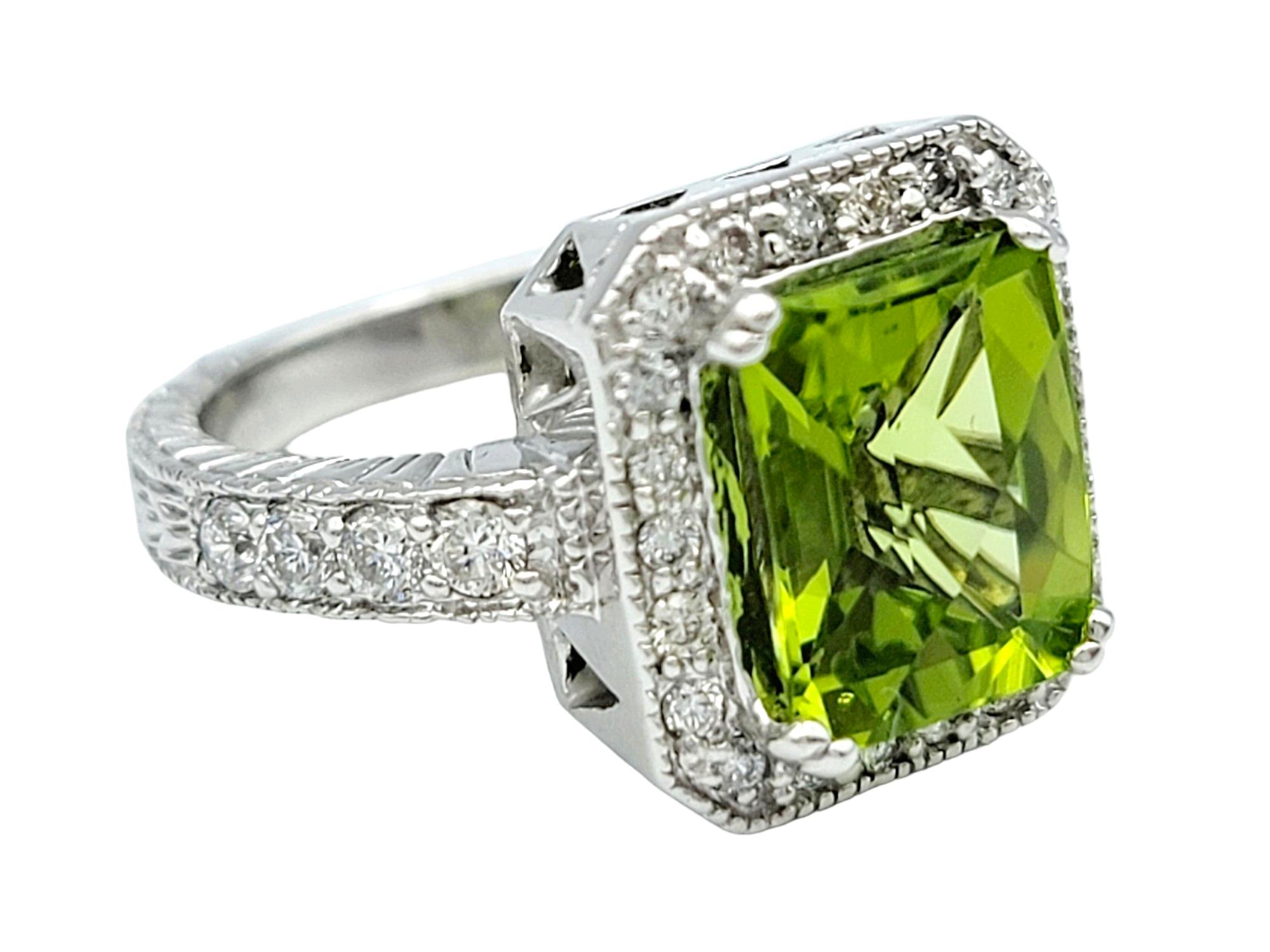 Contemporary Peridot and Diamond Halo Cocktail Ring with Milgrain Set in 14 Karat White Gold For Sale