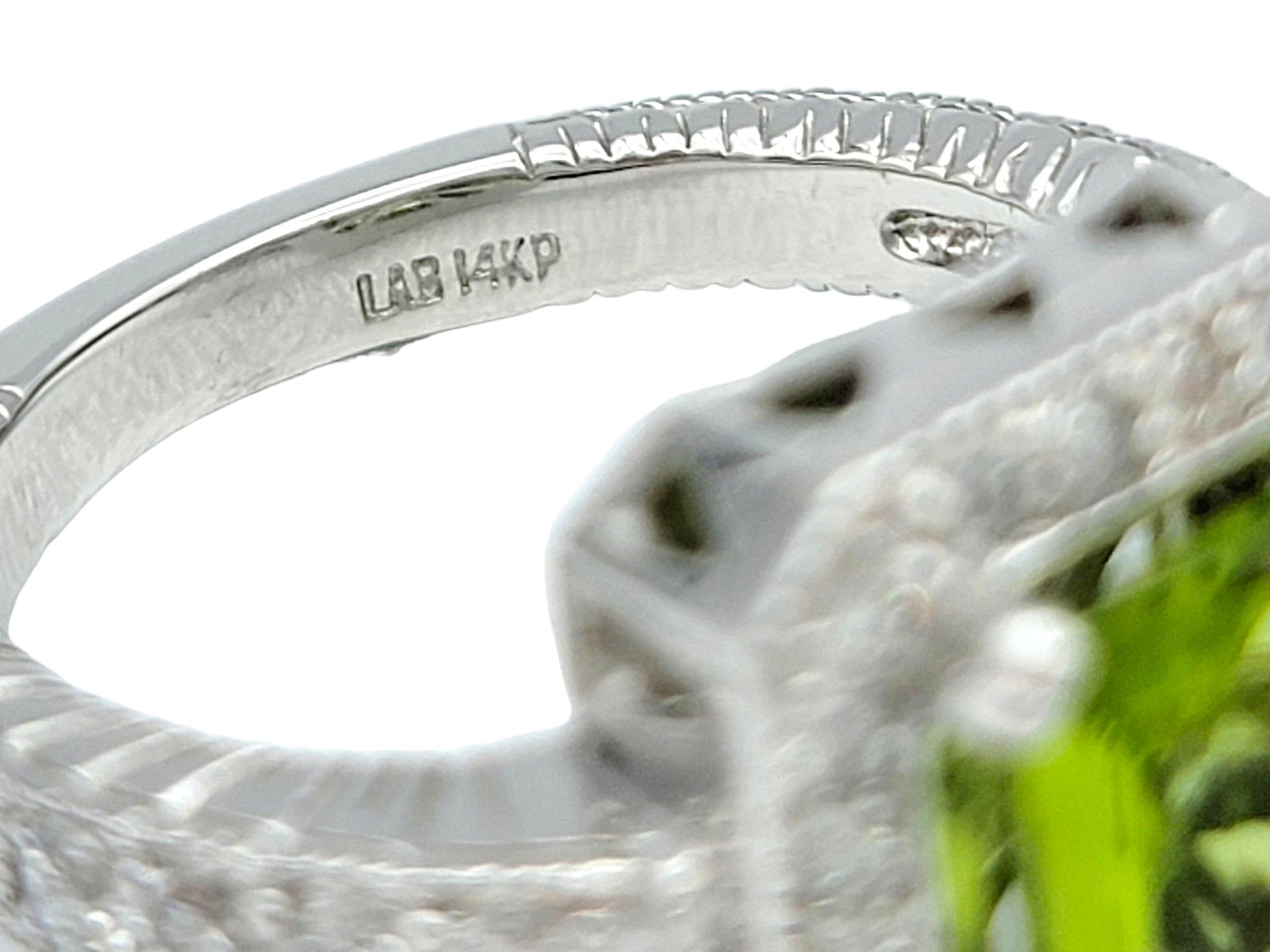 Women's Peridot and Diamond Halo Cocktail Ring with Milgrain Set in 14 Karat White Gold For Sale