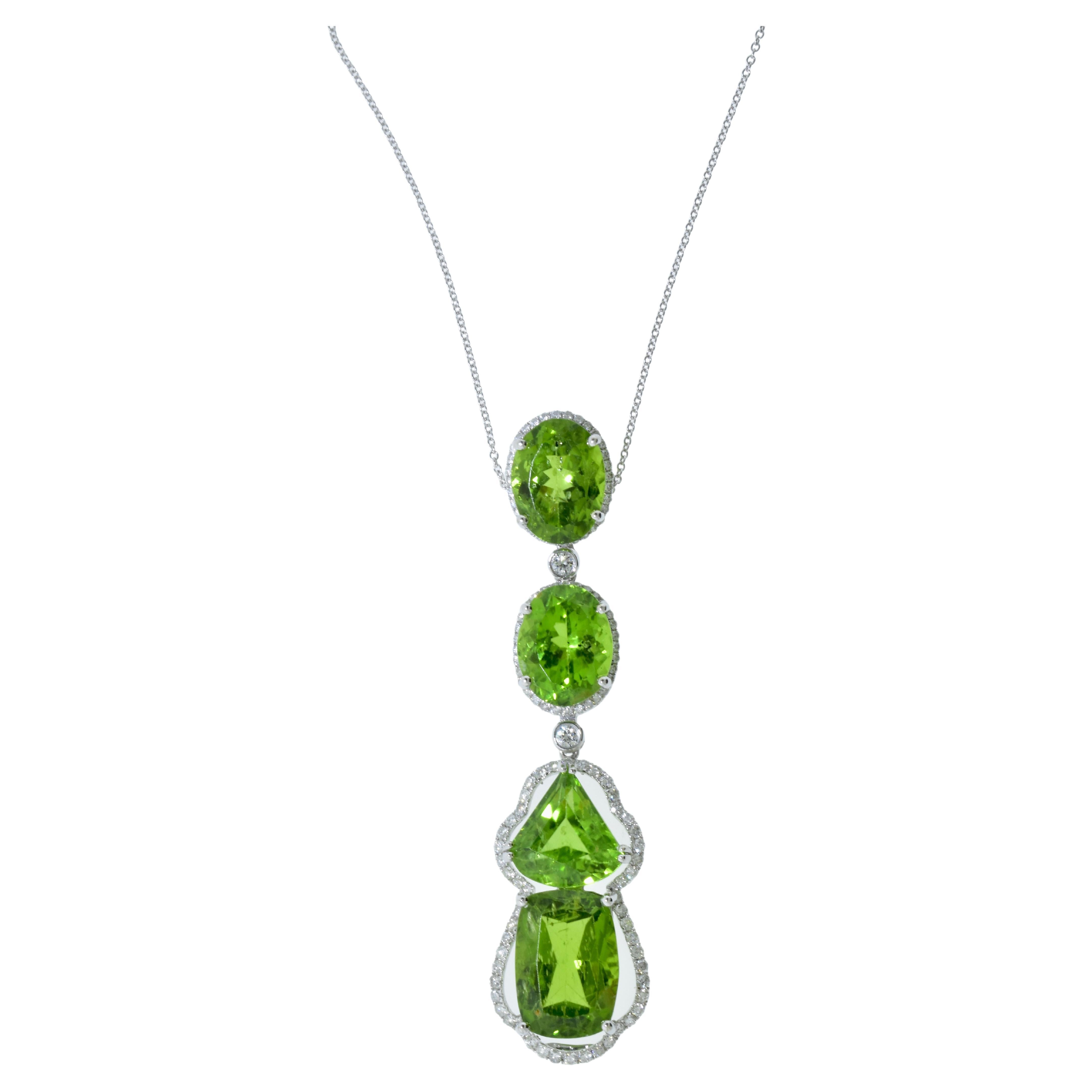 Diamond and peridot pendant necklace.  27 is the magic number of carats of lime green fancy natural peridot shapes that spell out - at least symbolically - the word 