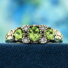 Peridot and Diamond Vintage Style Three Stones Ring in Solid 9K Yellow Gold