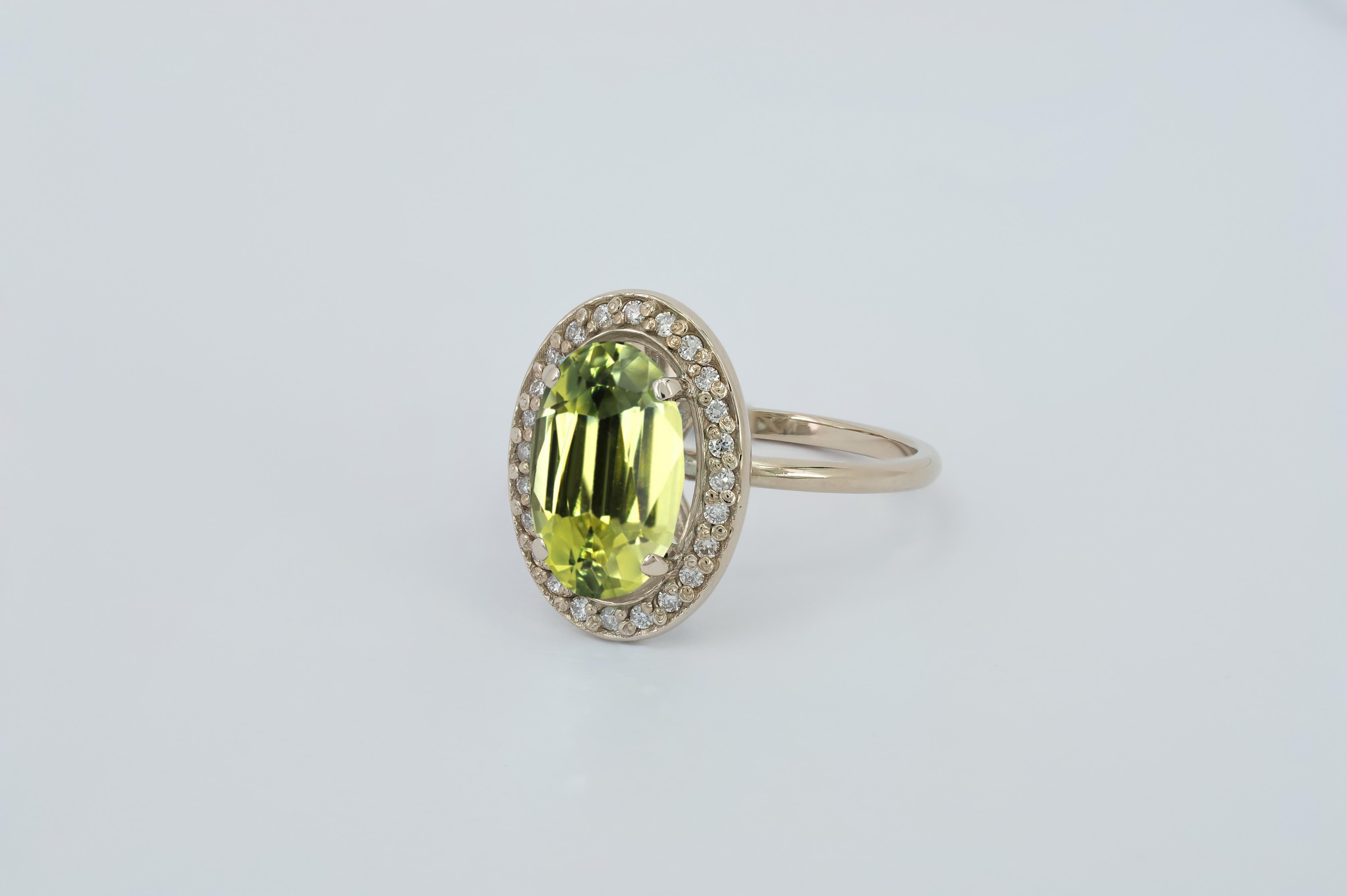 Women's Peridot and diamonds 14k gold ring.  For Sale