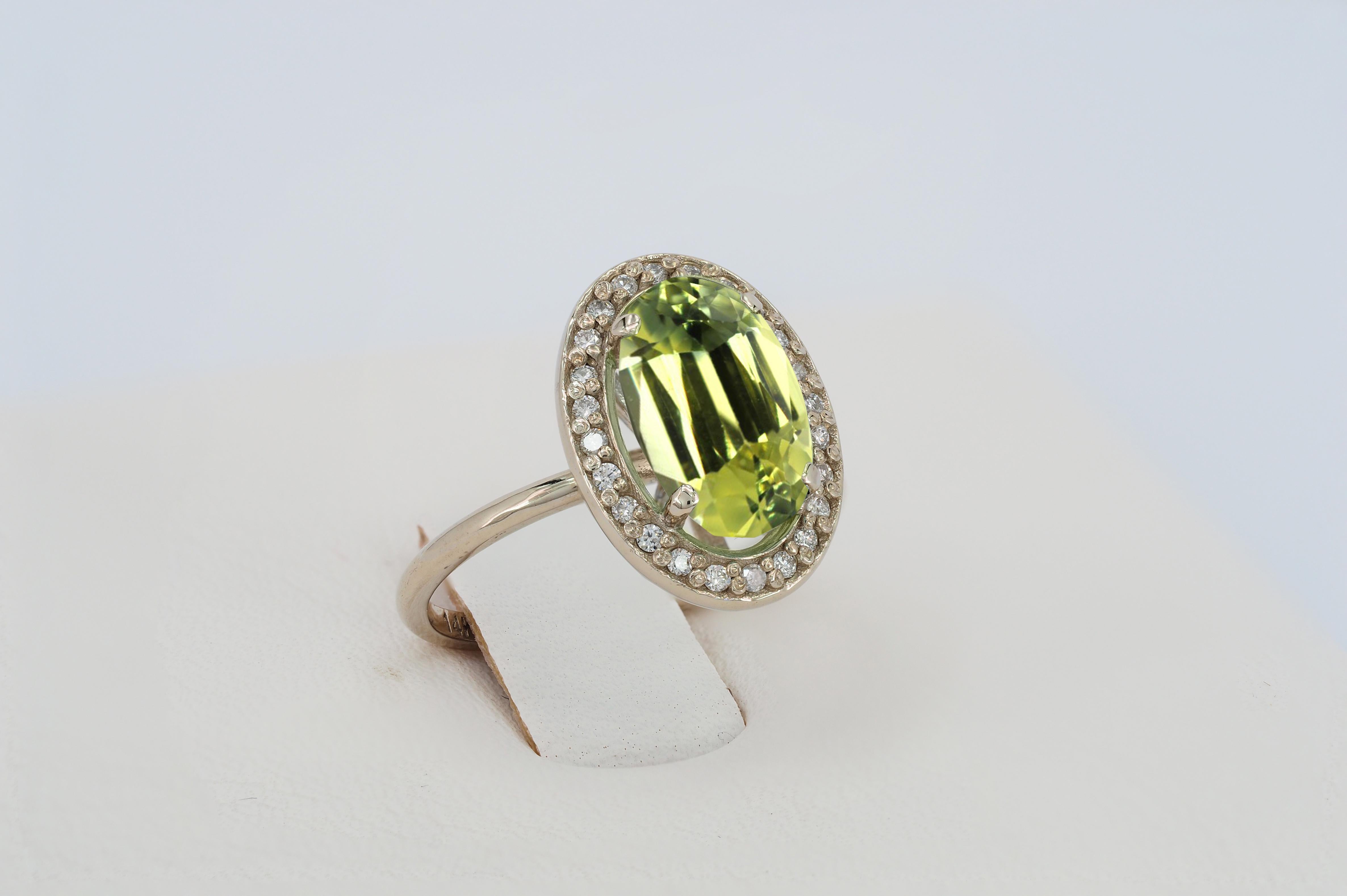 For Sale:  Peridot and diamonds 14k gold ring. 8