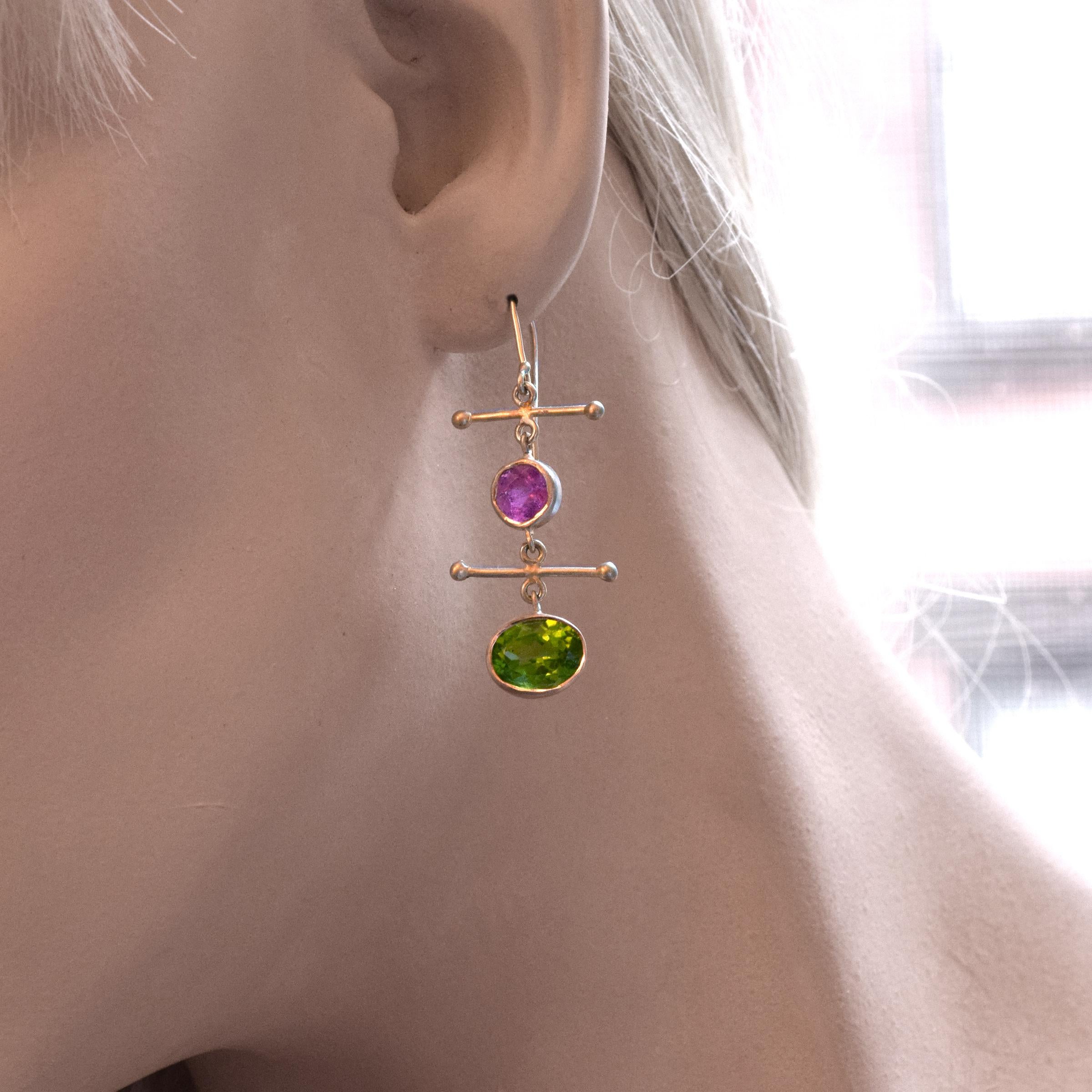 These one of a kind earrings feature 5.49 carats of faceted oval peridots and 2.135 carats of faceted pink tourmaline rounds all suspended from my 18K Gold Crossbars, inspired by Victorian watch fobs --  Hand-fabricated in my Soho, NYC studio.
All