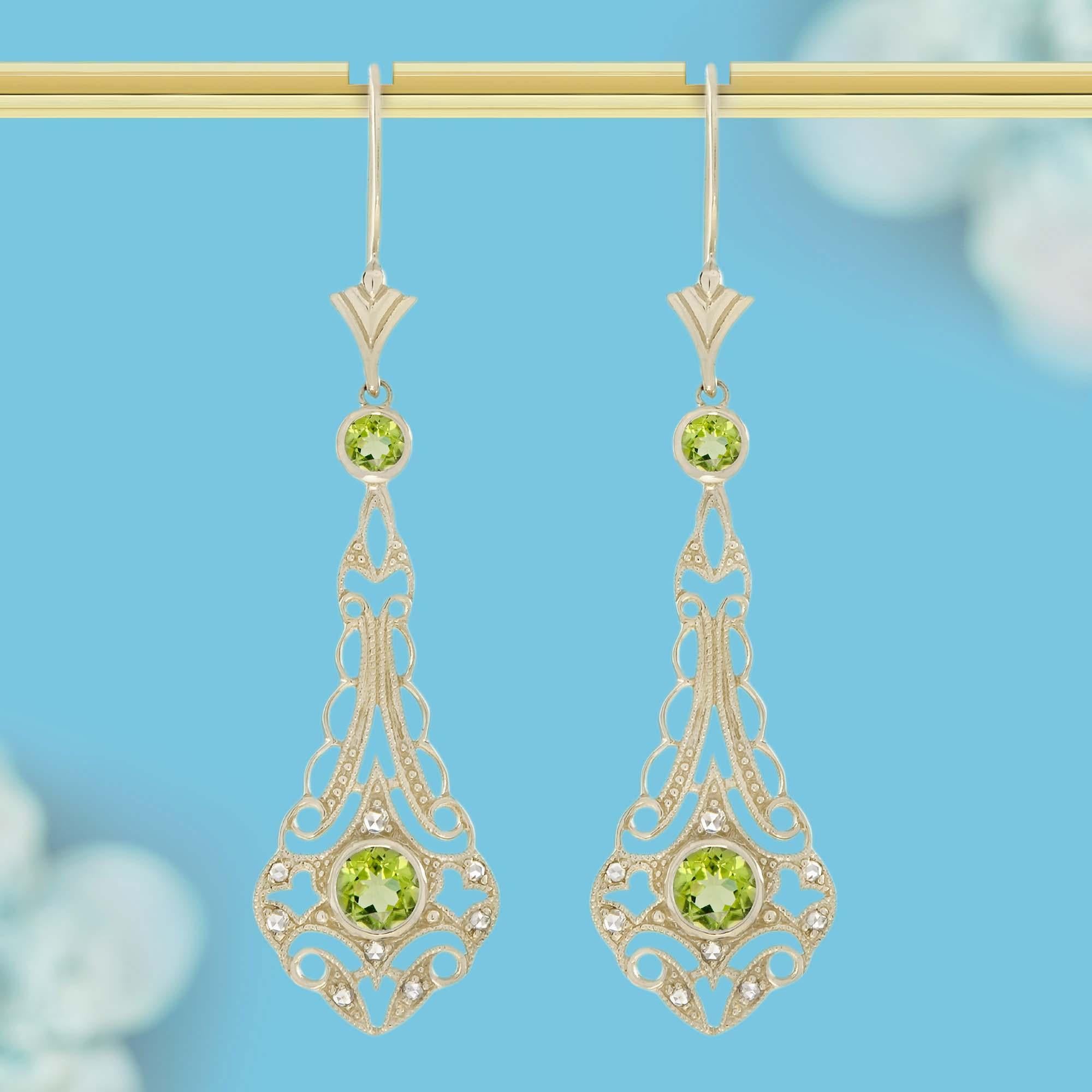 Featuring a striking Natural Peridot and Rose Cut Diamond Filigree Dangle Design, these earrings showcase a beautiful peridot at the center of a drop-shaped setting. Surrounding the gemstone, rose cut diamonds are thoughtfully arranged to highlight