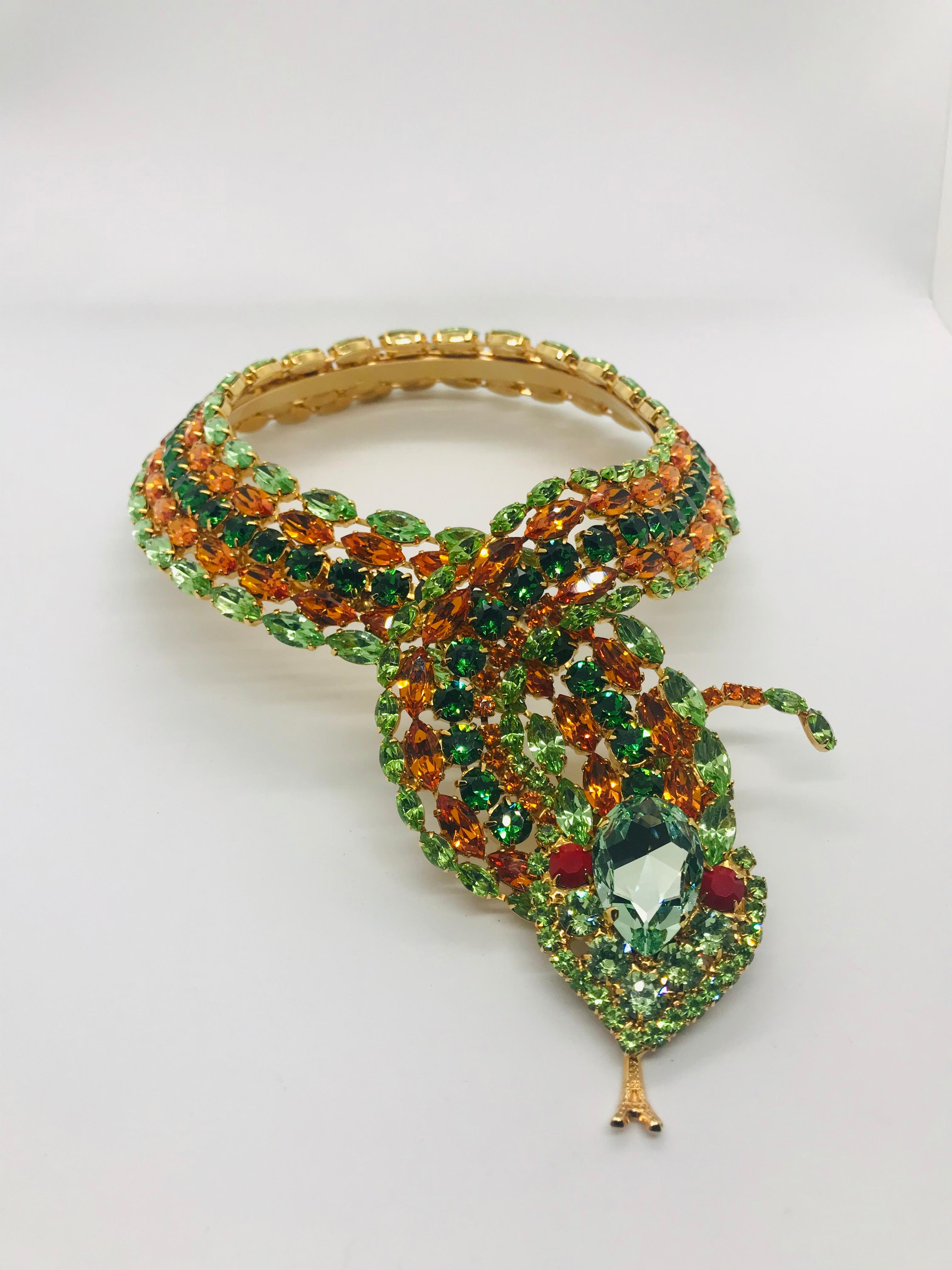 Our tropical and bright peridot and and tangerine vintage Swarovski Austrian crystal snake necklace is a bold choice to add to anyone's wardrobe!  We call him a 