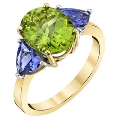 Peridot and Tanzanite Three-Stone Ring in Yellow and White Gold, 3.62 Carats