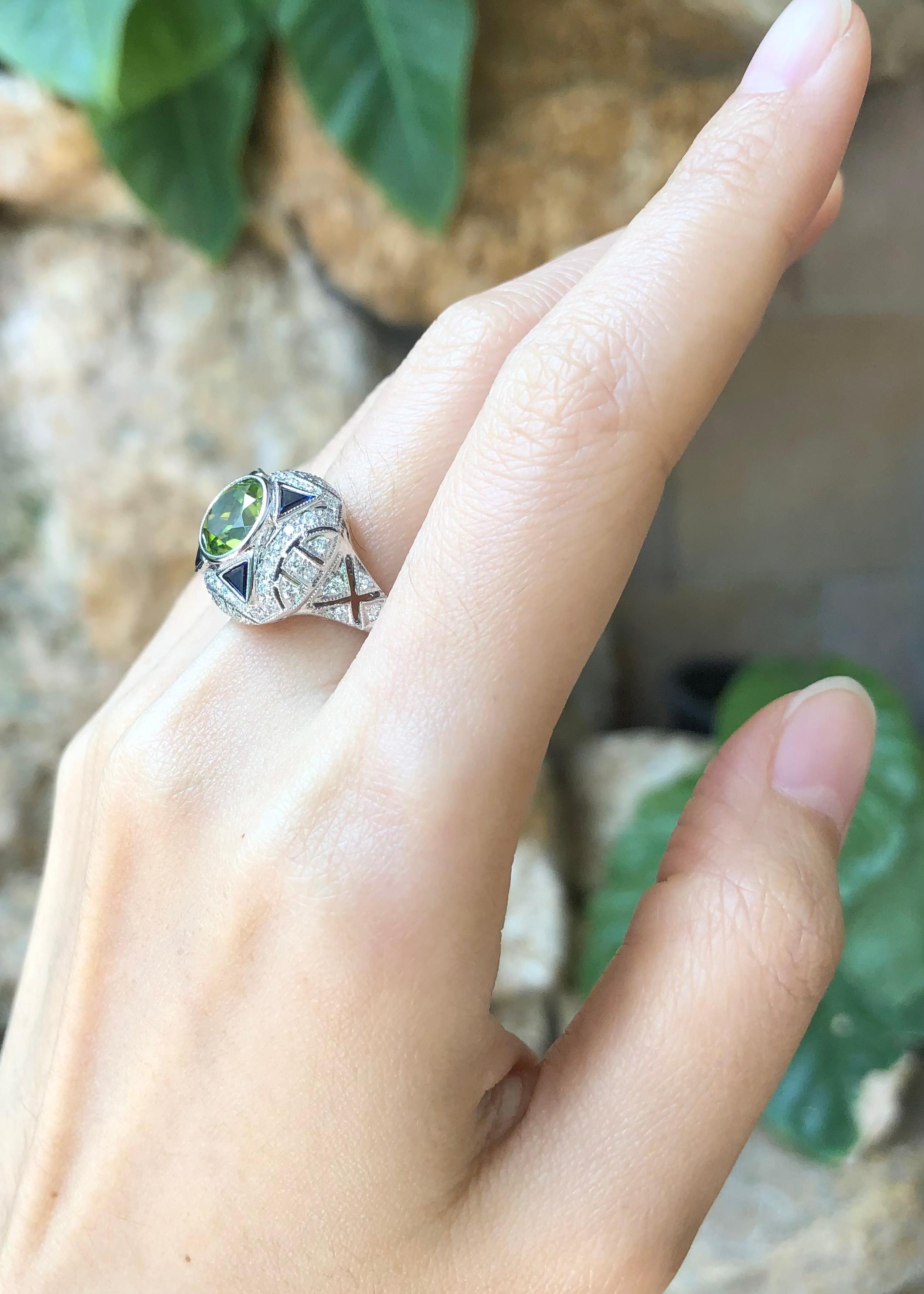 peridot and emerald engagement ring