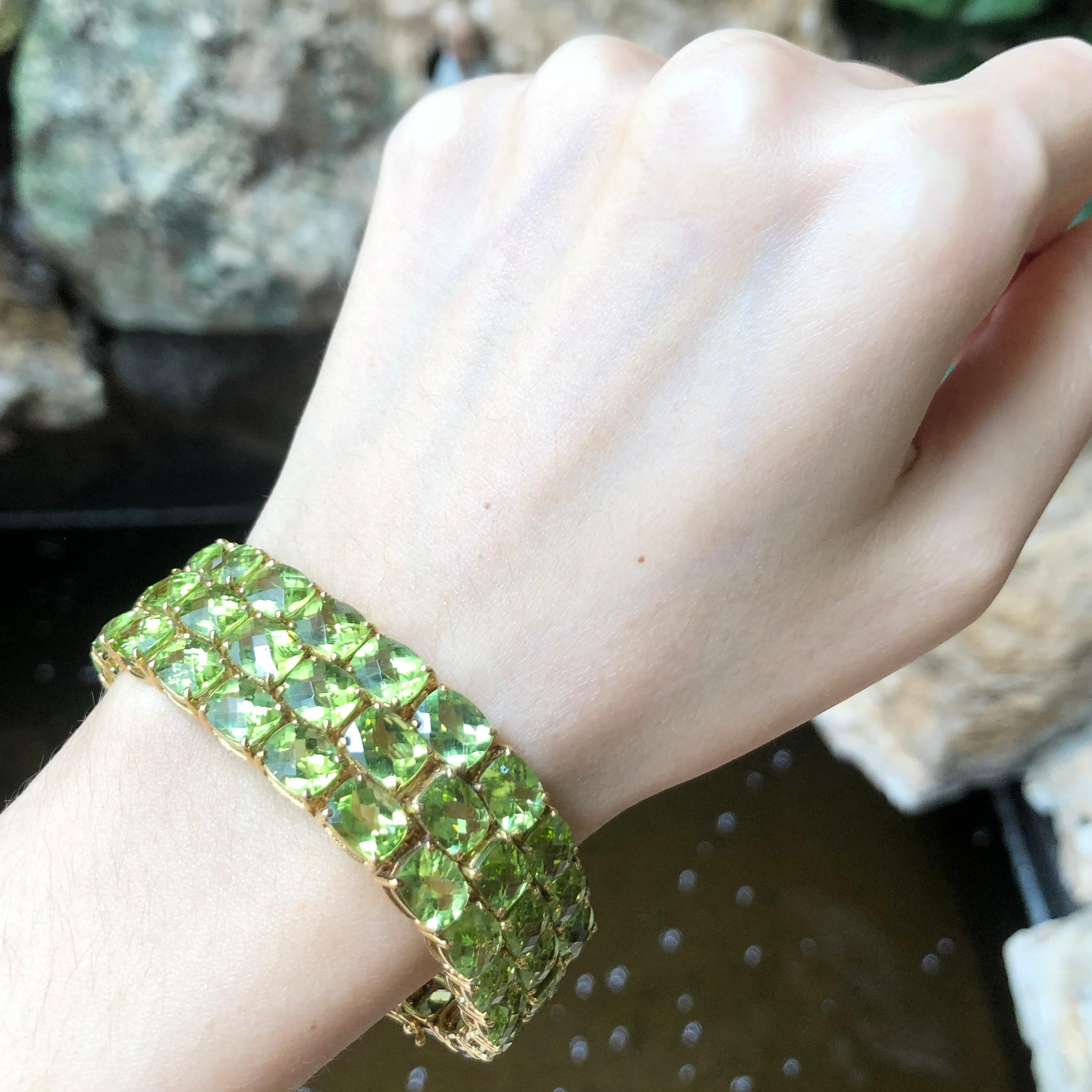 Peridot  Armband aus 14 Karat Gold in verschiedenen Fassungen (Zeitgenössisch)