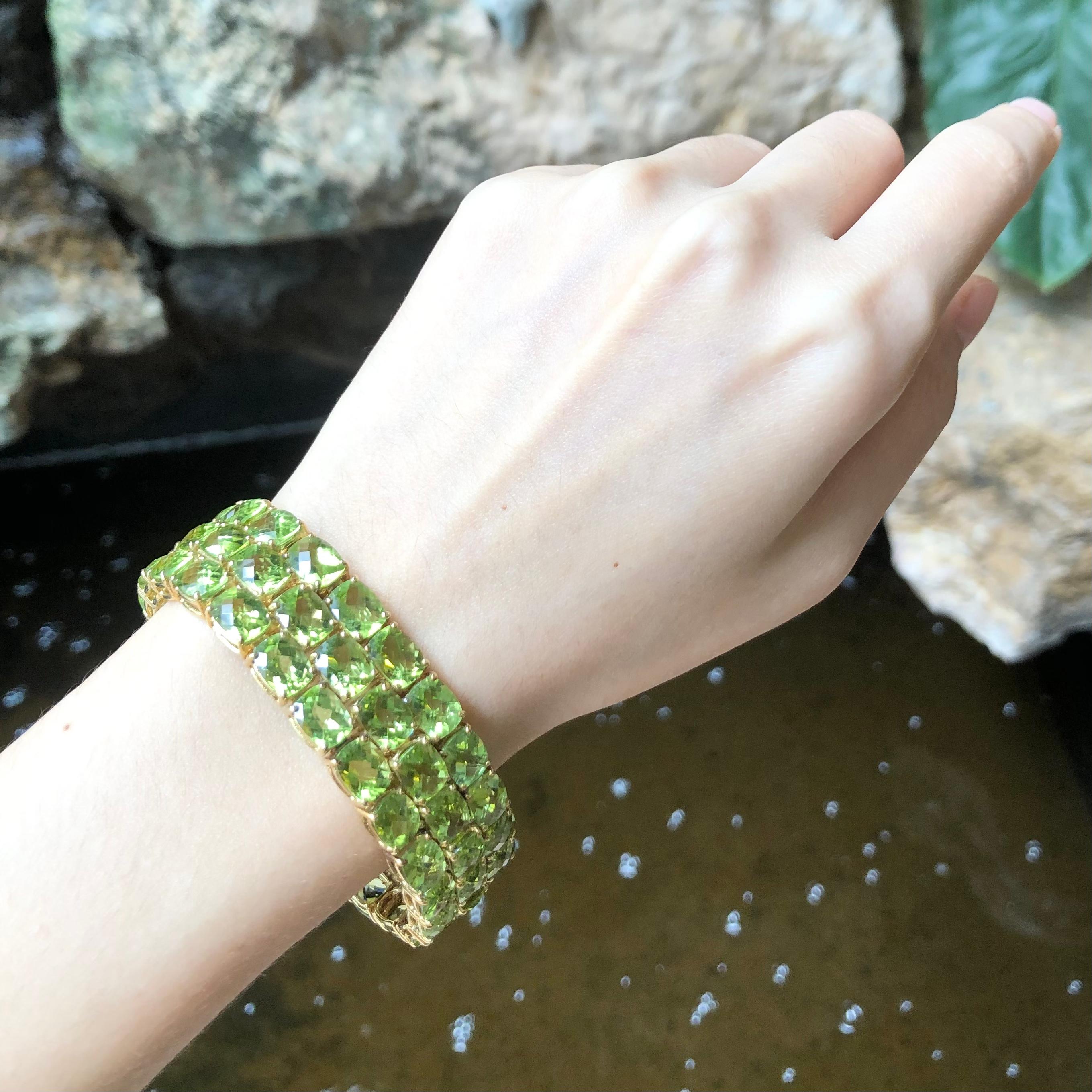 Peridot  Armband aus 14 Karat Gold in verschiedenen Fassungen (Ovalschliff)