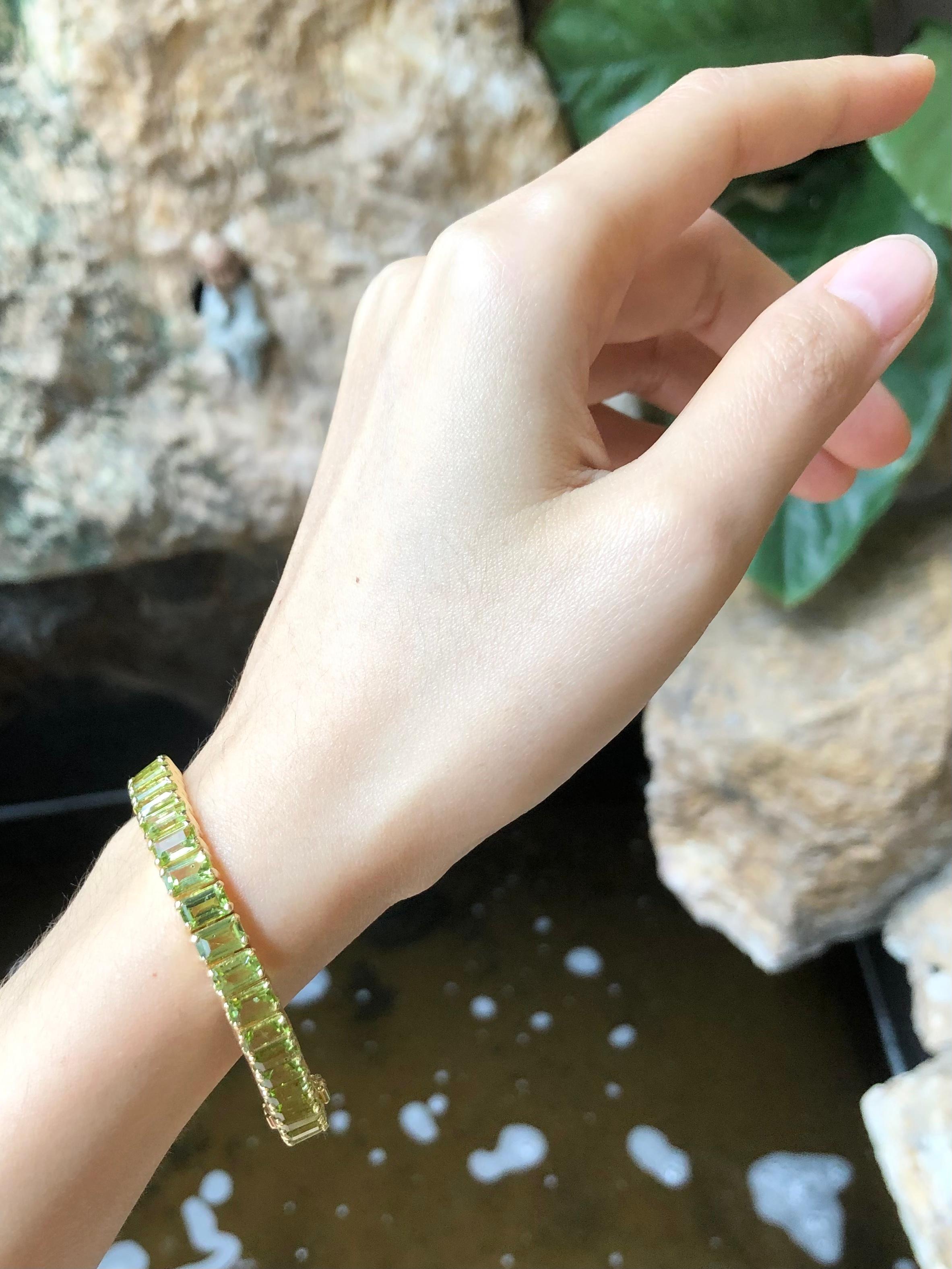 Women's Peridot Bracelet Set in 14 Karat Gold Settings For Sale