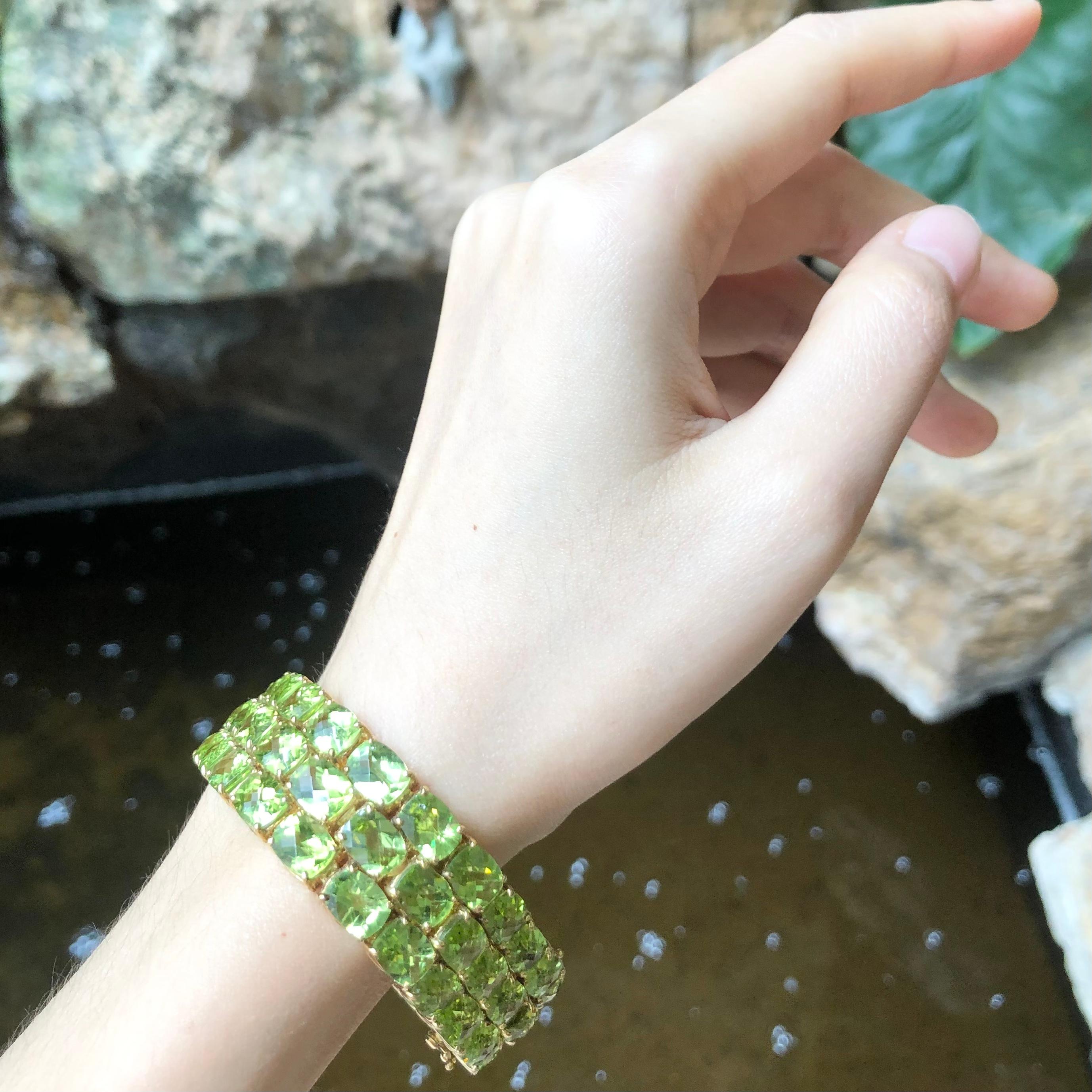 Peridot  Armband aus 14 Karat Gold in verschiedenen Fassungen Damen
