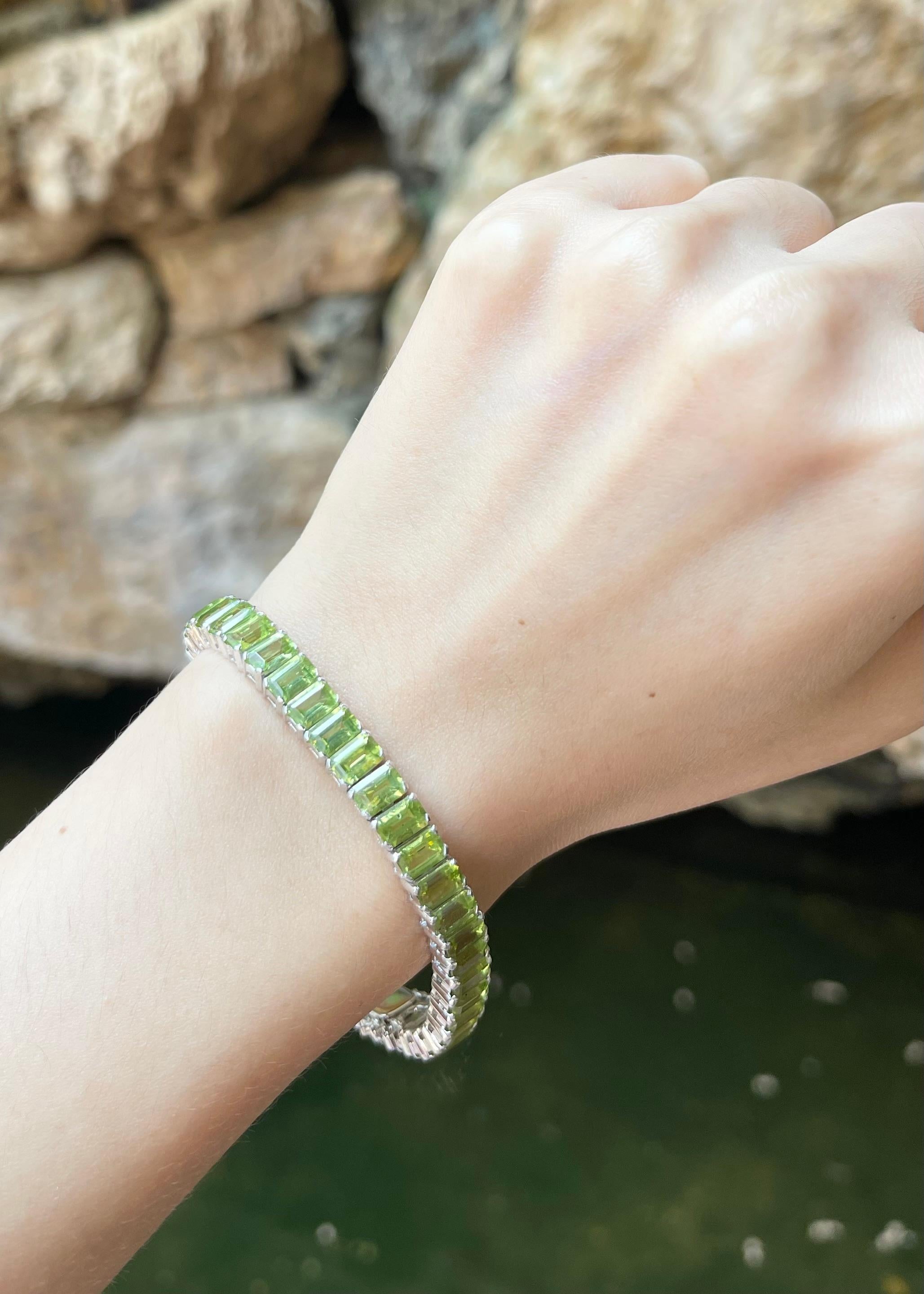 Emerald Cut Peridot Bracelet set in 14K White Gold Settings For Sale