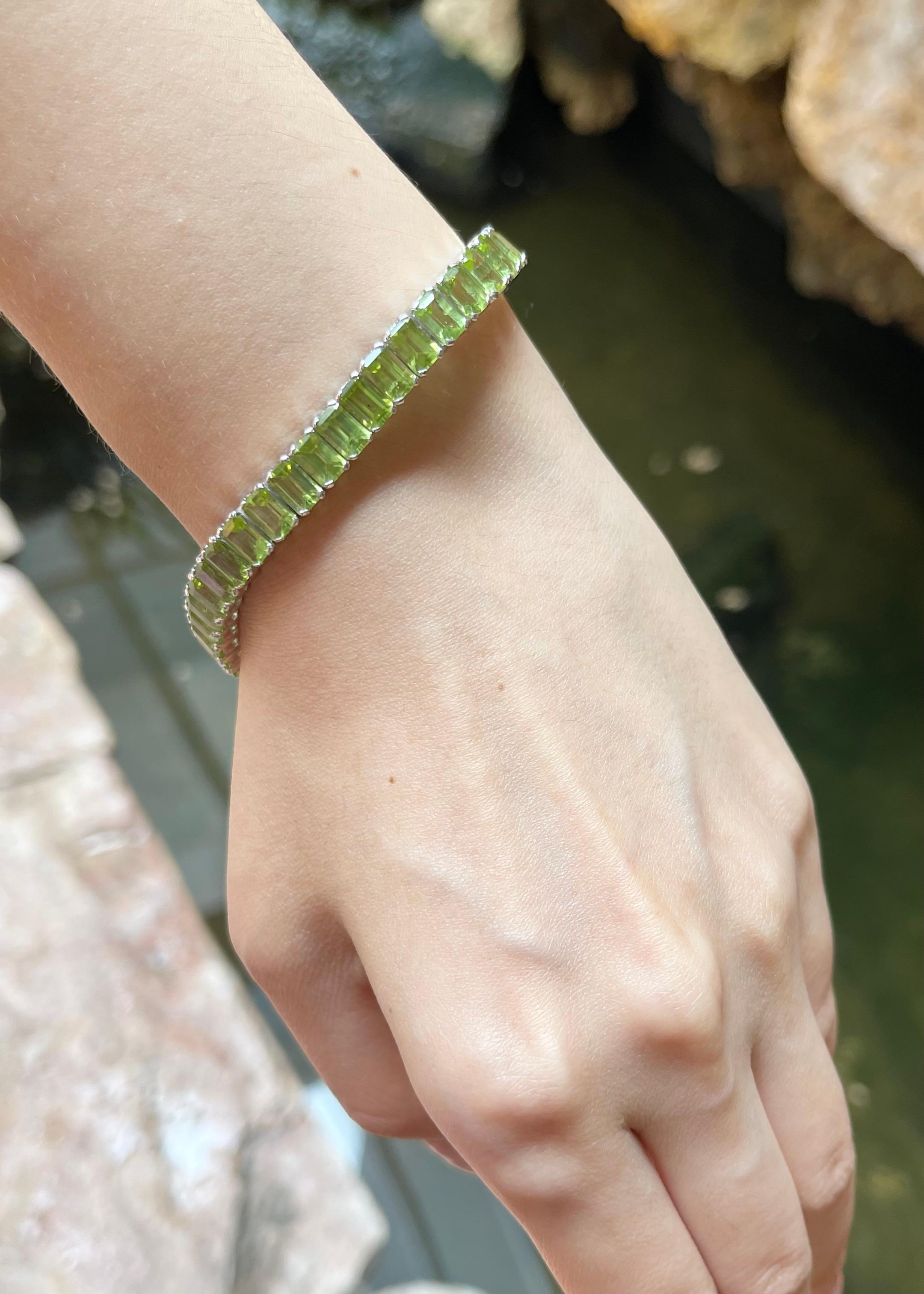 Women's Peridot Bracelet set in 14K White Gold Settings For Sale
