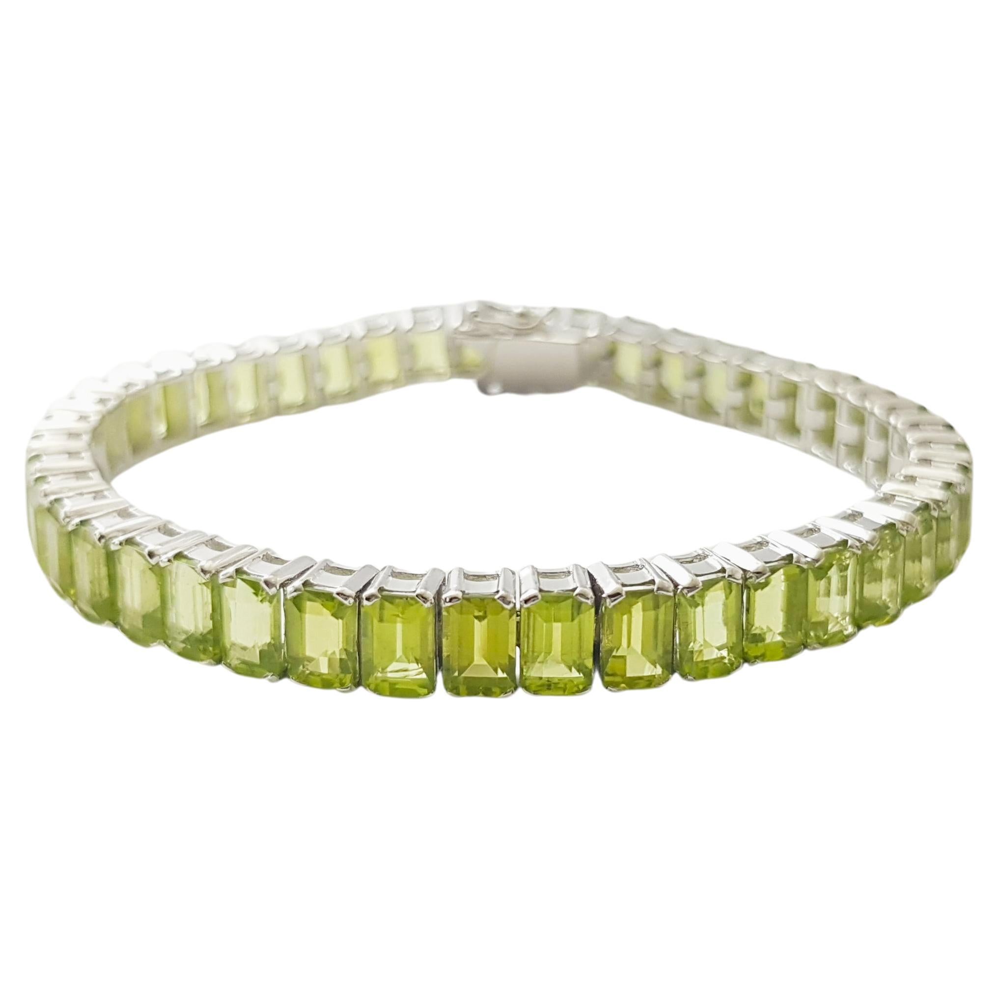 Peridot Bracelet set in 14K White Gold Settings