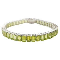 Peridot Bracelet set in 14K White Gold Settings