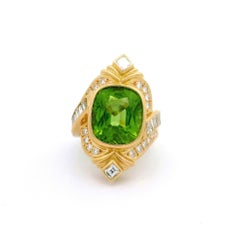 Anello con diamante peridoto in oro giallo 18 carati