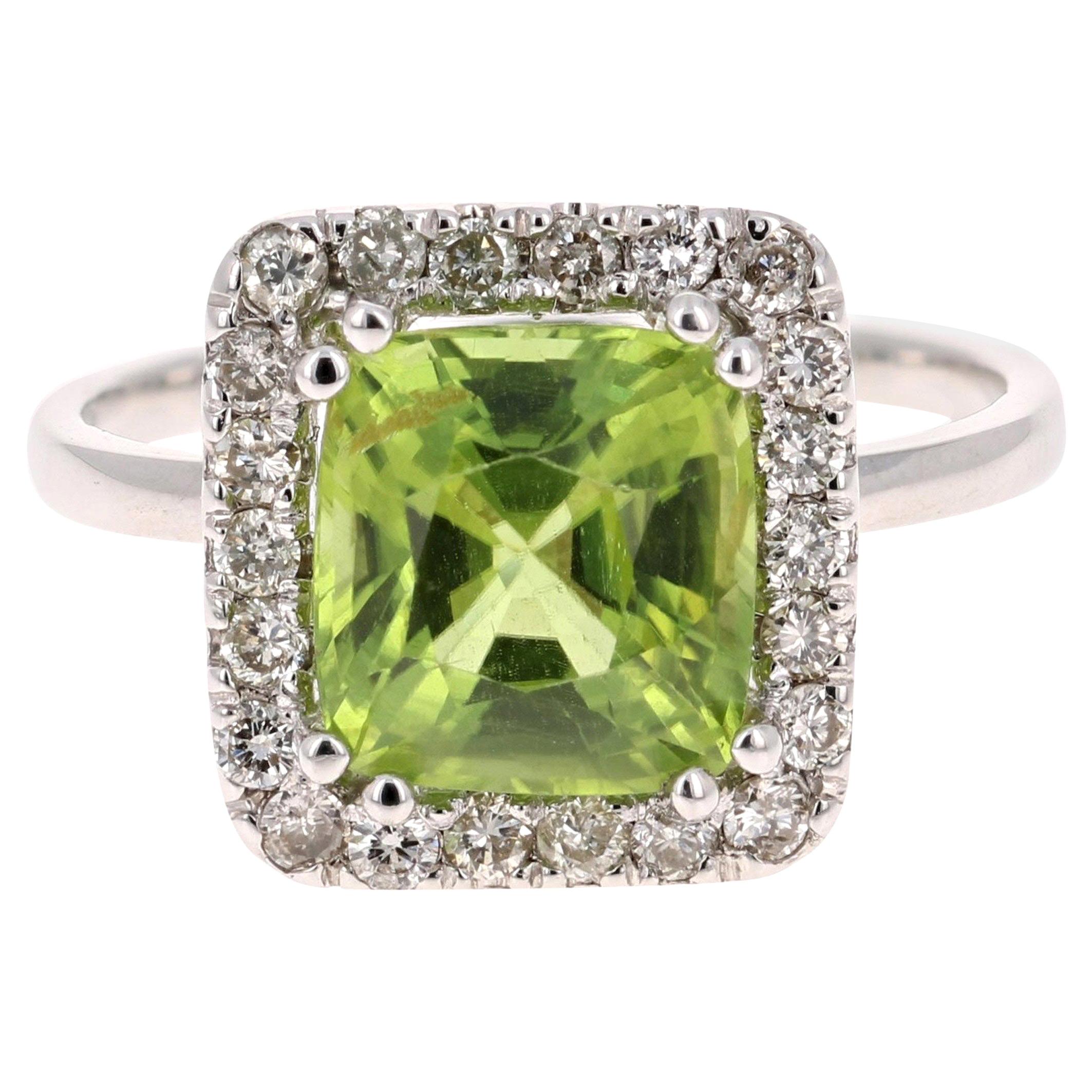 Ring aus Weißgold mit Peridot und 3,52 Karat Diamant