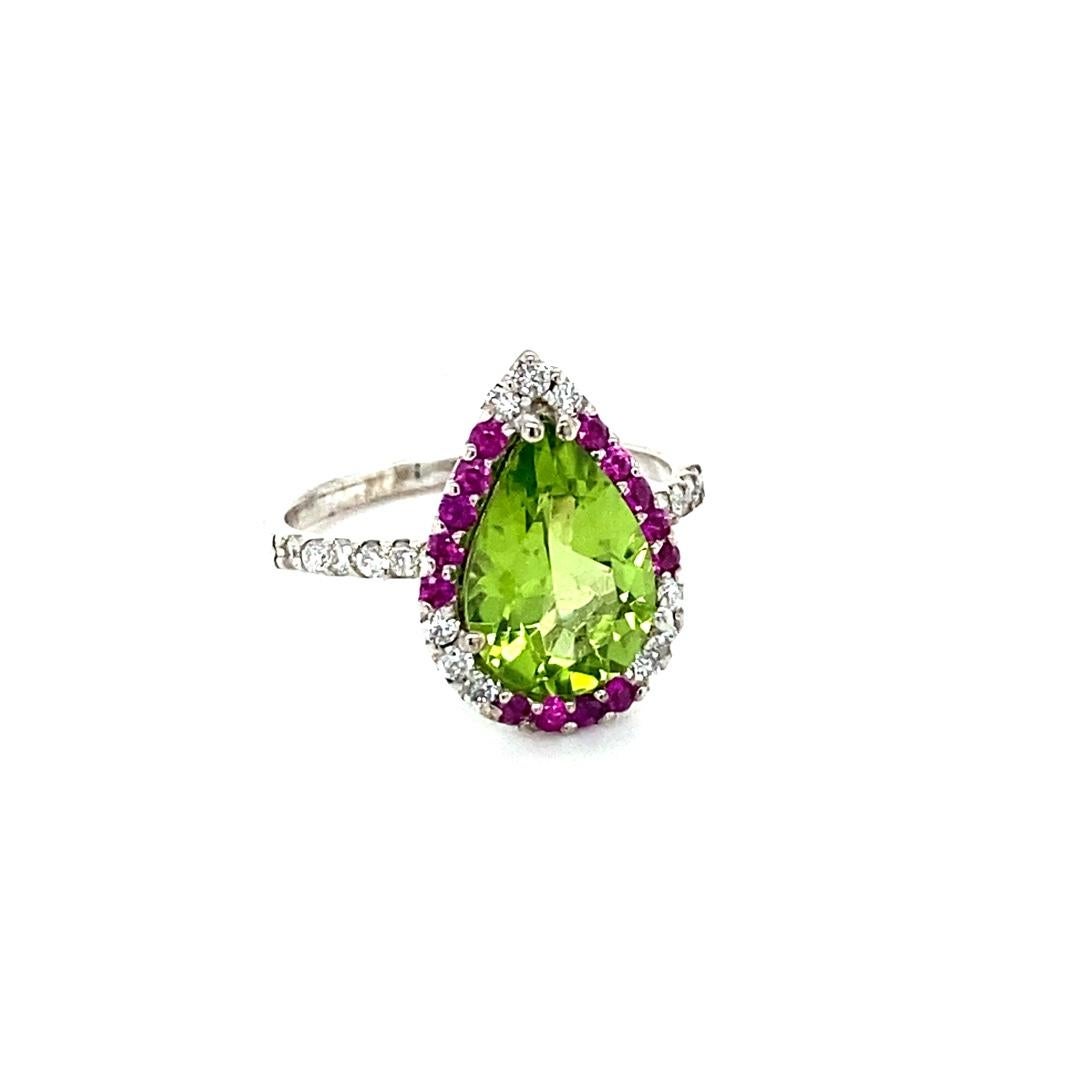 Contemporary Peridot Diamond and Pink Sapphire White Gold Cocktail Ring For Sale