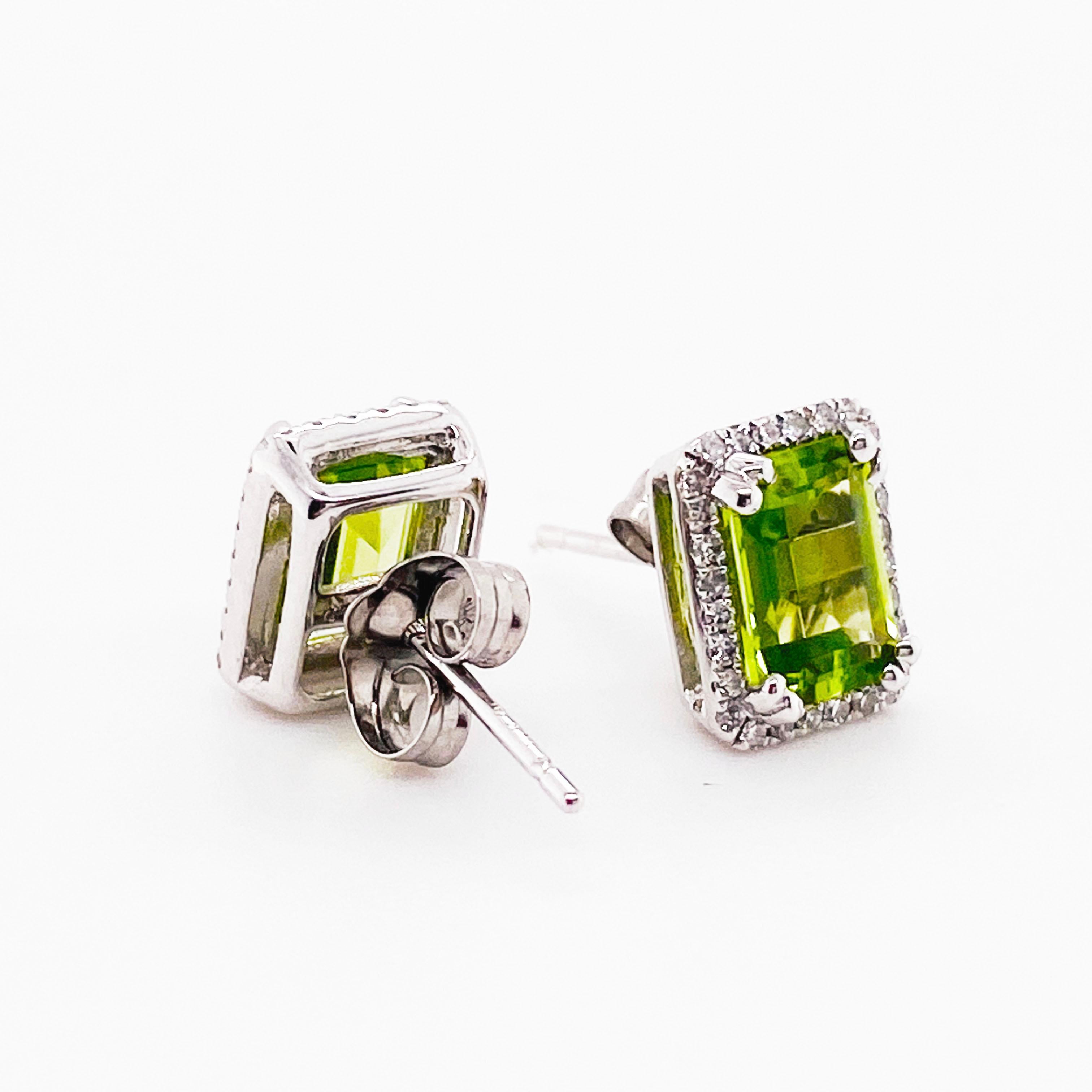 The Genuine Peridot Earrings are constructed in 14 karat white gold and have a halo of diamonds around an emerald cut peridot in each earring.  There are a total of 2.02 carats of peridot and .20 carats of diamonds!  There are a total of 56 diamonds