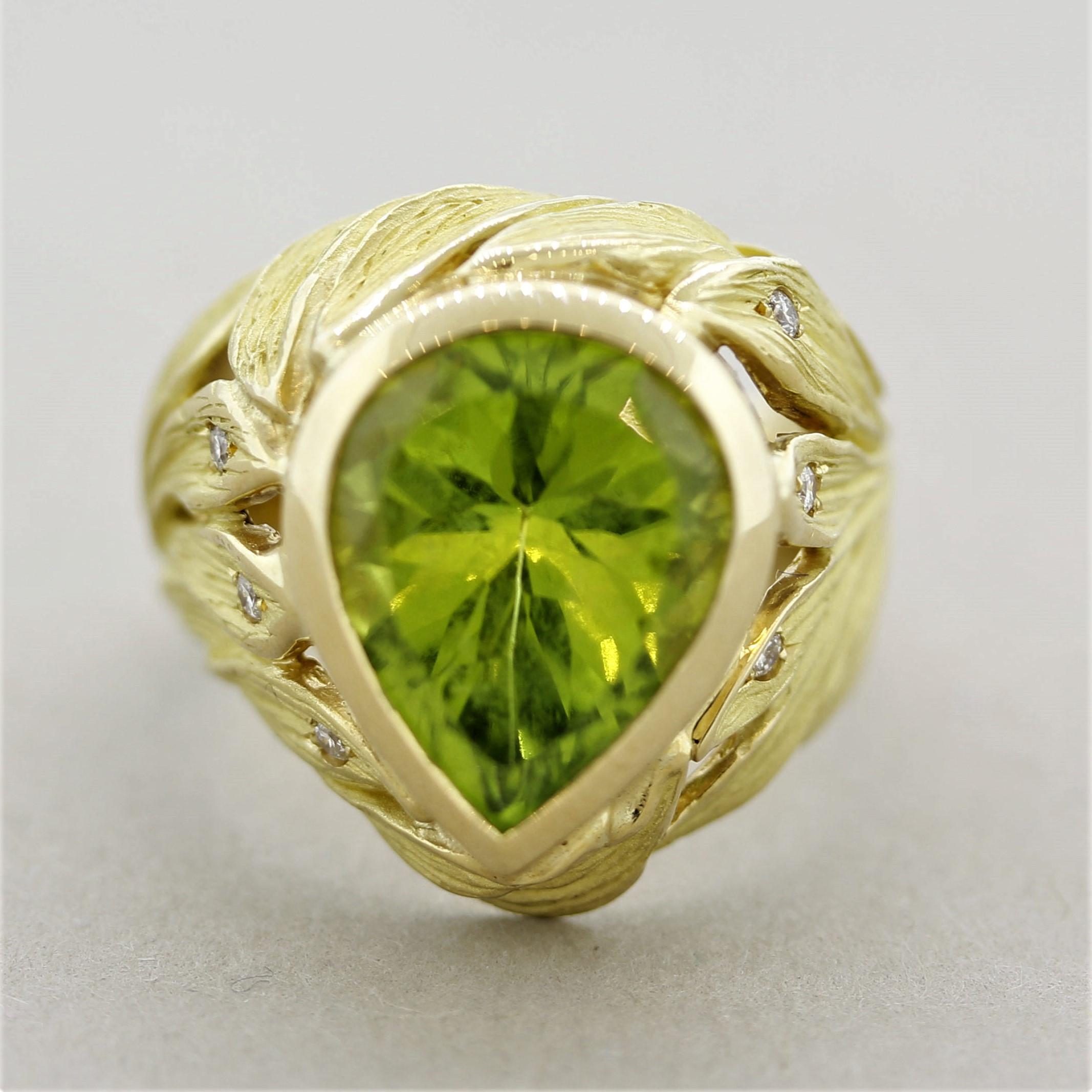 One of our favorite rings in the collection! It features a pear-shaped peridot weighing 5.76 carats which is bezel-set in the center of the ring. Accenting the piece are 6 round brilliant-cut diamonds weighing 0.06 carats which add hints of sparkle