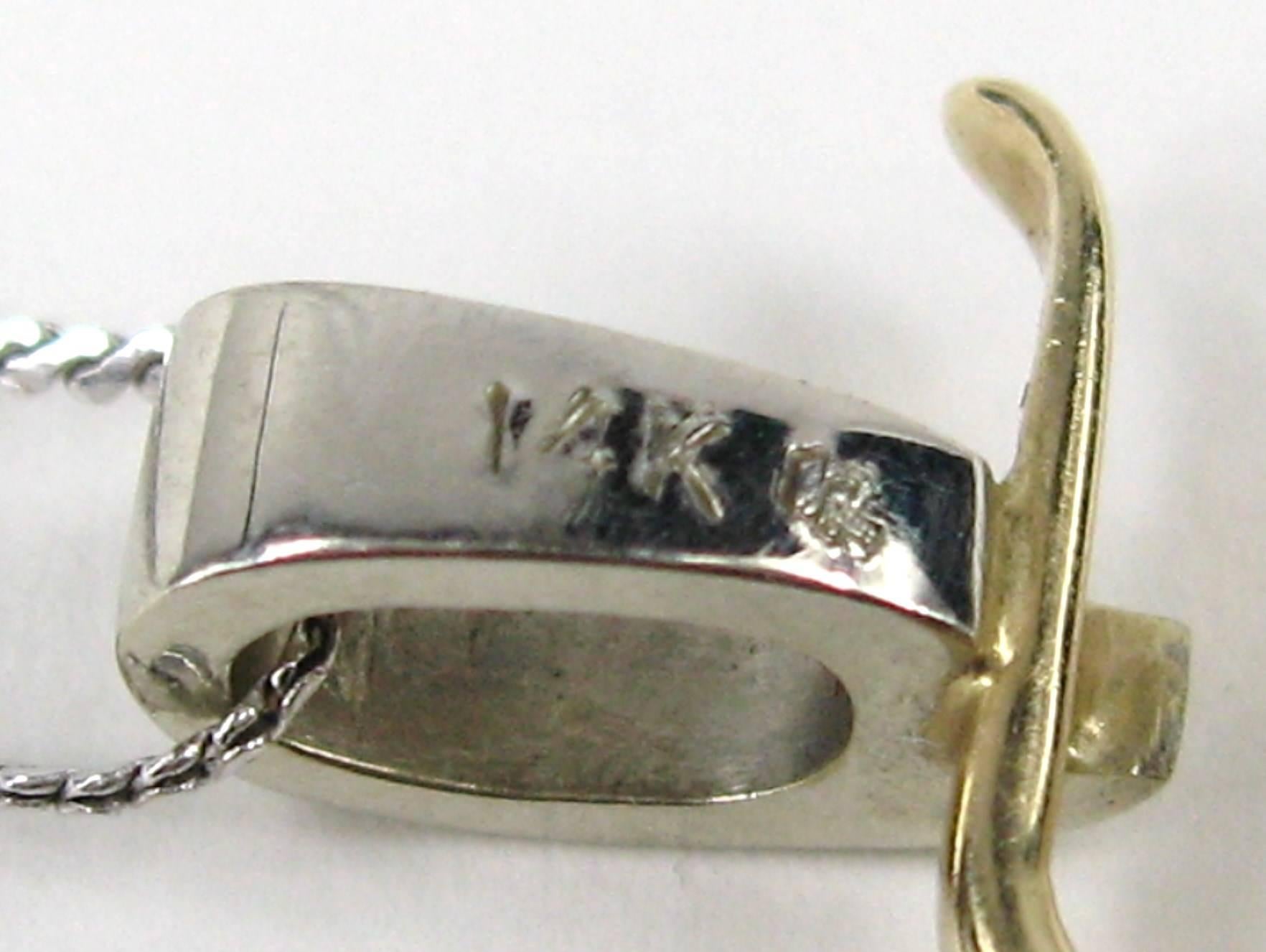 Halskette mit Schlangenanhänger aus Gold mit Peridot und Diamant (Brillantschliff) im Angebot