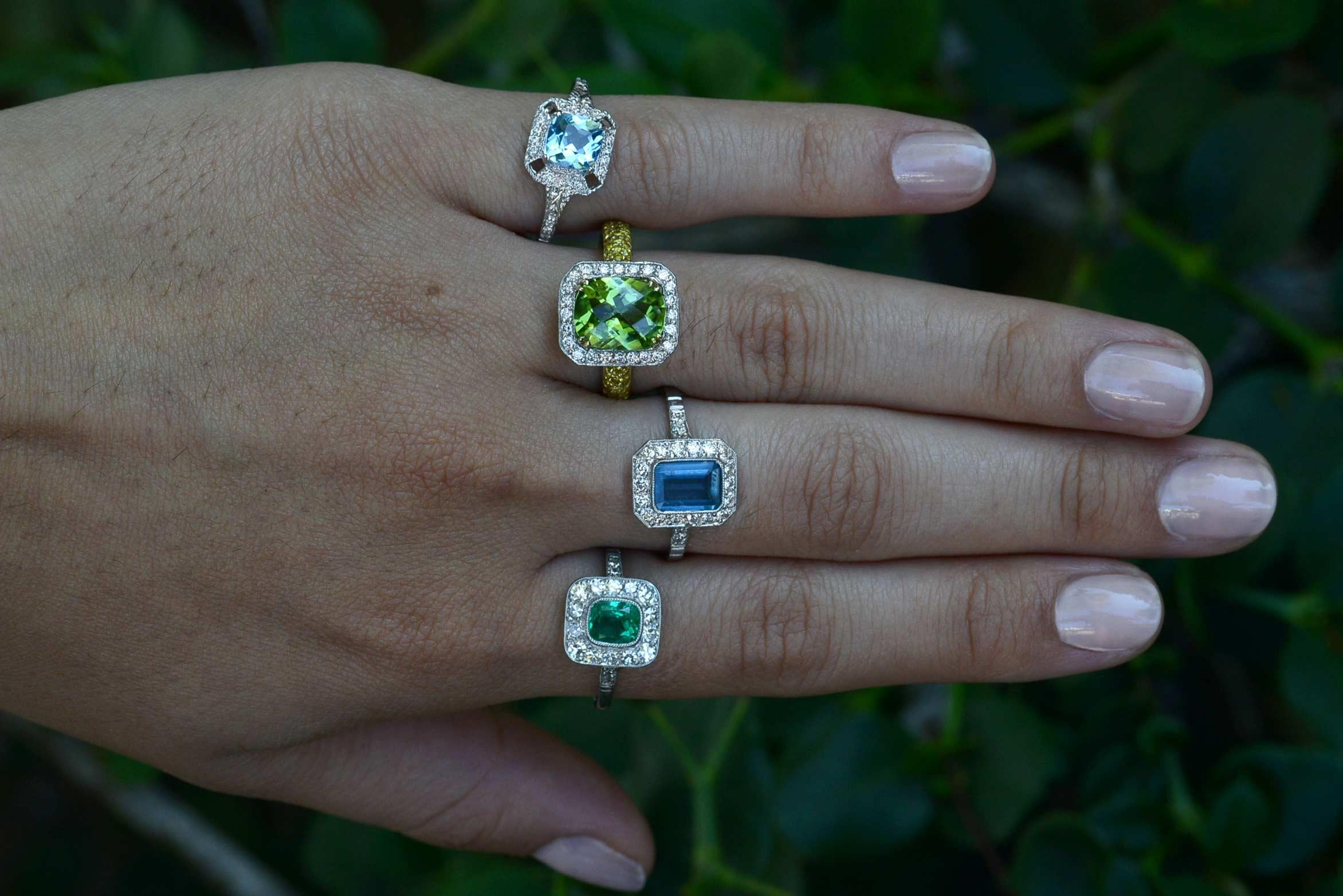 Glowing with a fire from within, the verdant green peridot sits regally, surrounded by a diamond halo. Finely fabricated of 18k gold and platinum in an Etruscan revival style, you will love how this vintage heirloom is supported by a two-tone under