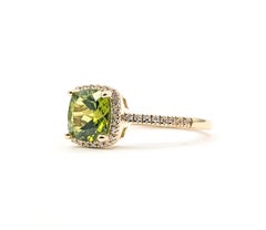 Peridot & Diamond Halo Ring in 14k Yellow Gold