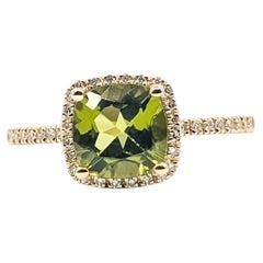 Peridot & Diamond Halo Ring in 14k Yellow Gold