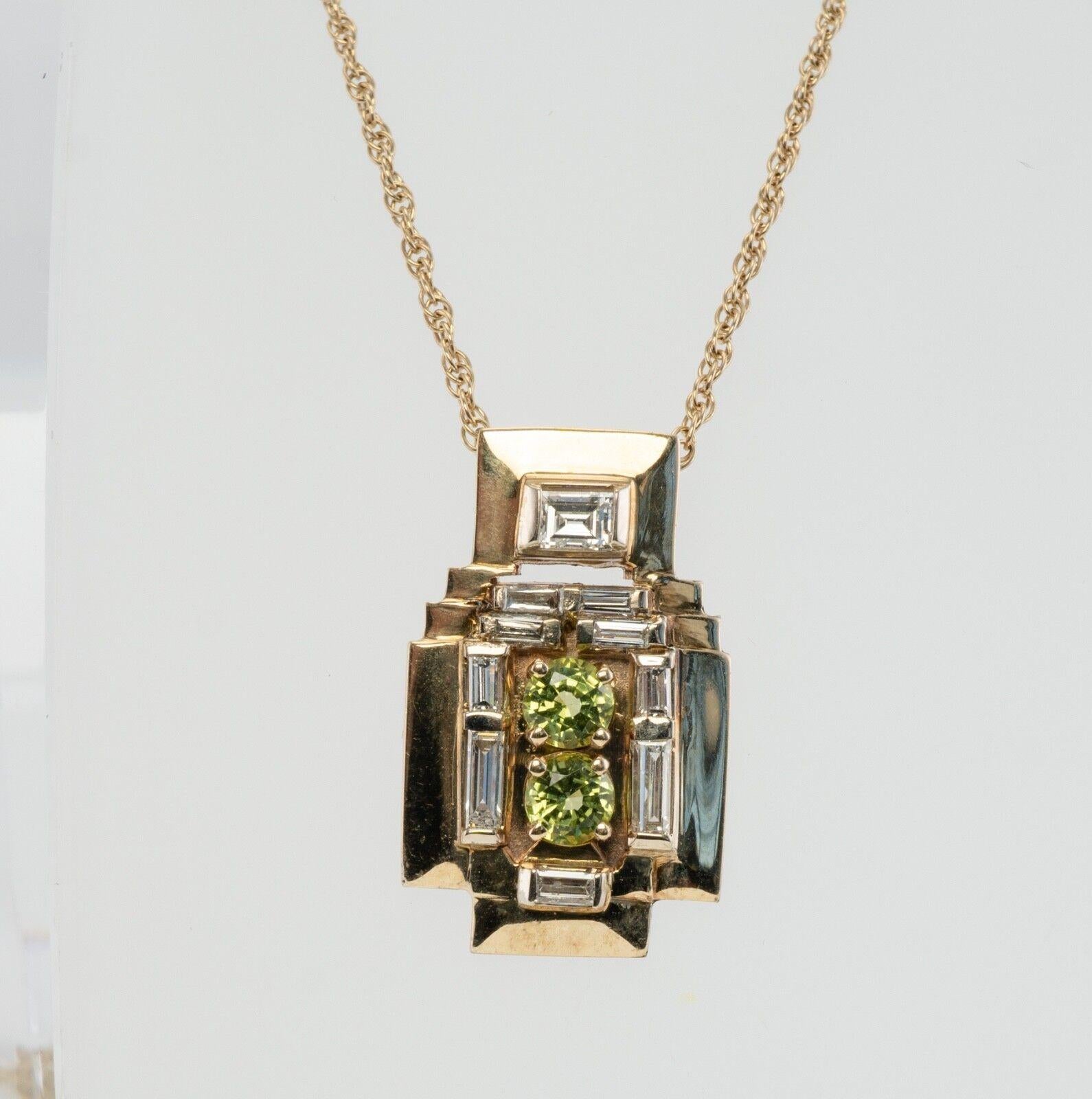 Peridot Diamond Pendant Necklace 14K Gold Vintage

This beautiful estate necklace is finely crafted in solid 14K Yellow gold and set with genuine Peridots and diamond baguettes. Two 3mm each peridot are very clean and transparent gems of great