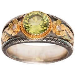 Vintage Peridot, Diamond Ring in 18 Karat Gold and Sterling Silver
