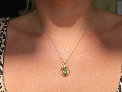 Collana con ciondolo in oro giallo 14 carati con diamante peridoto