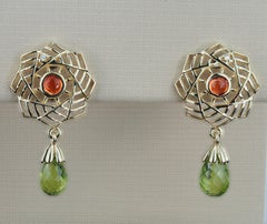 Peridot, yellow sapphire earrings in 14k gold.