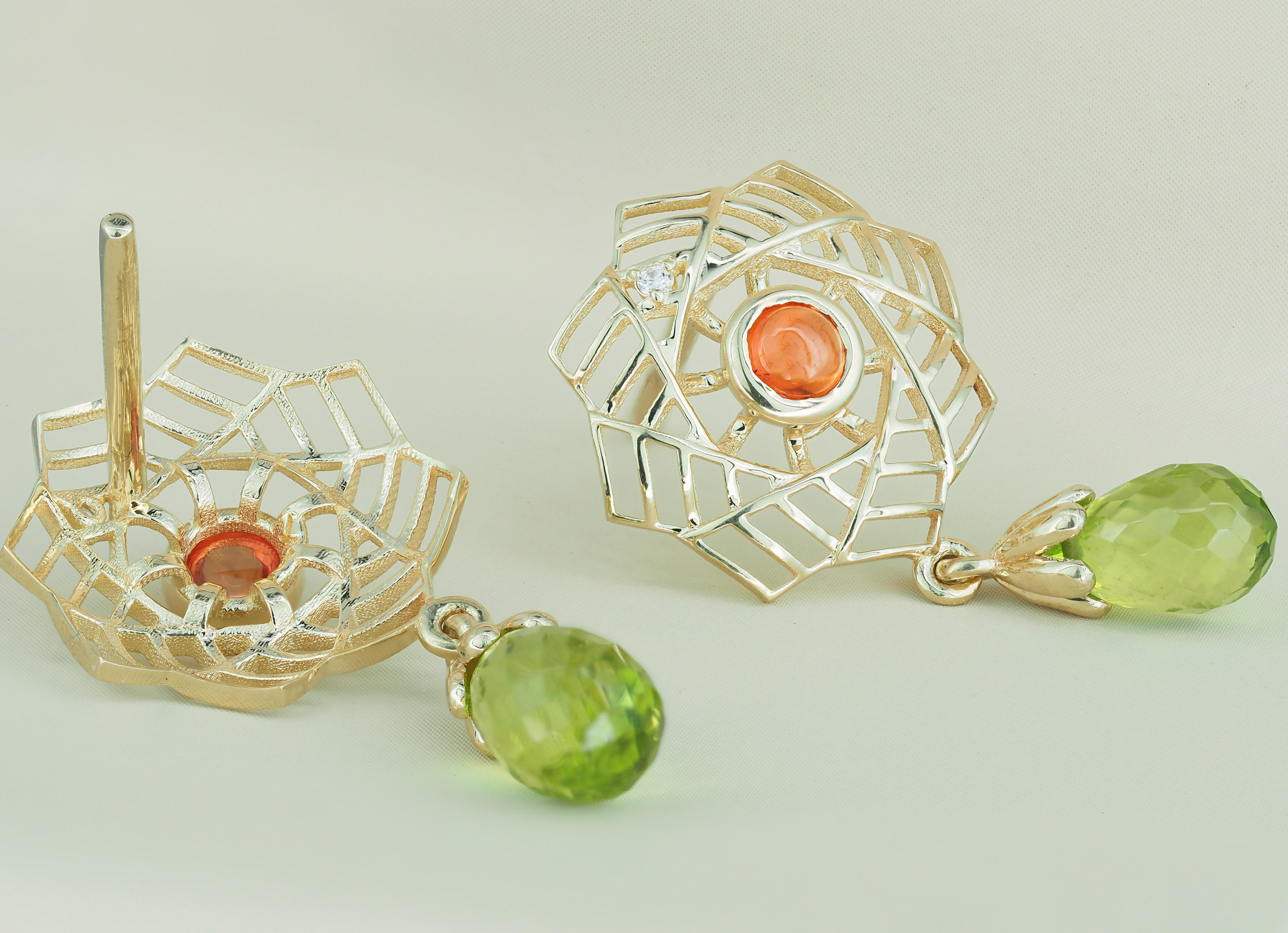 Briolette Cut Peridot, yellow sapphire earrings in 14k gold. For Sale