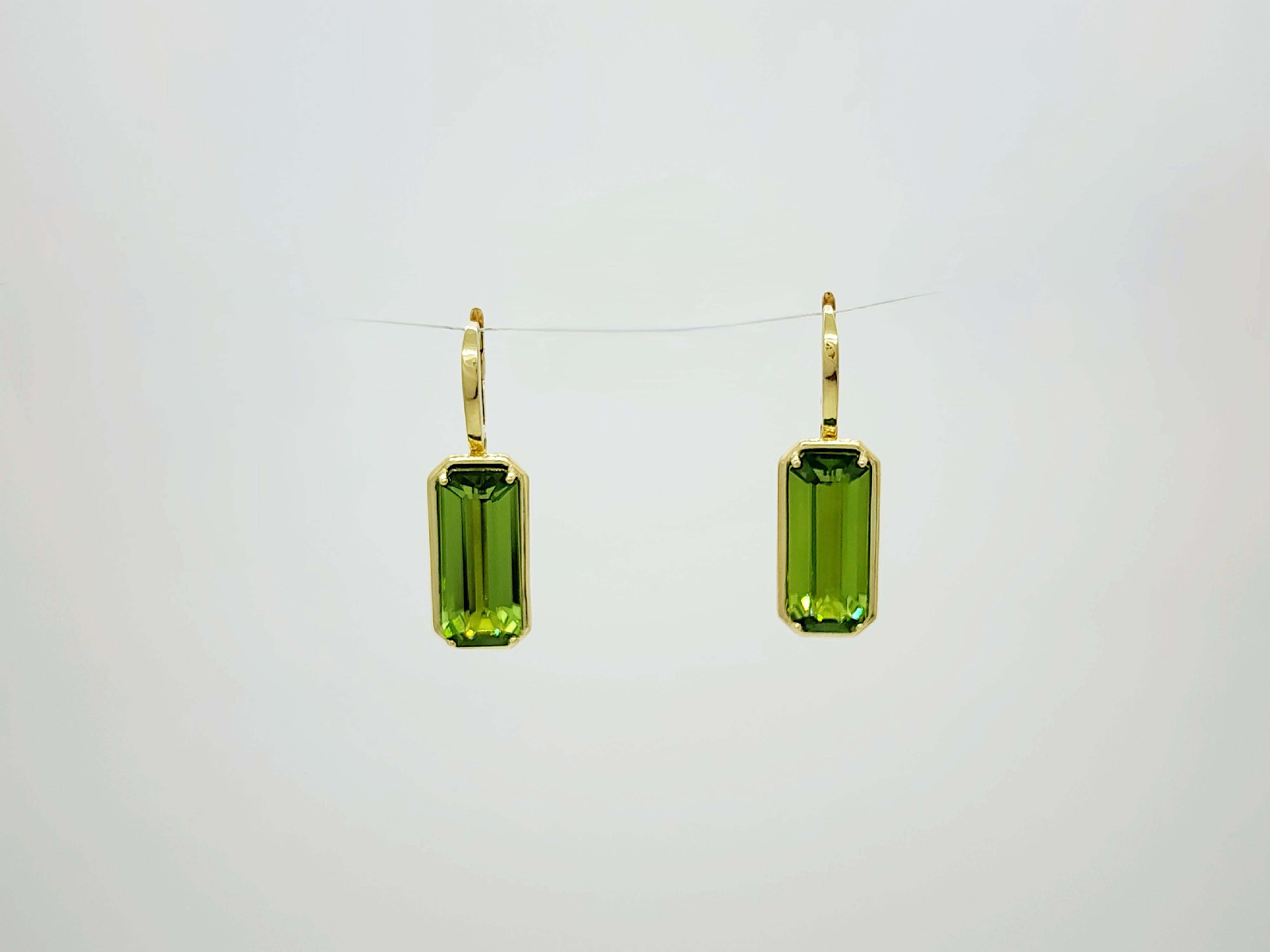 Beautiful 20.06 ct. gem quality emerald cut peridots handmade in 18k yellow gold.  These earrings are chic, easy to wear with any outfit, and classy.