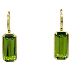Peridot Emerald Cut Dangle Earrings in 18k Yellow Gold