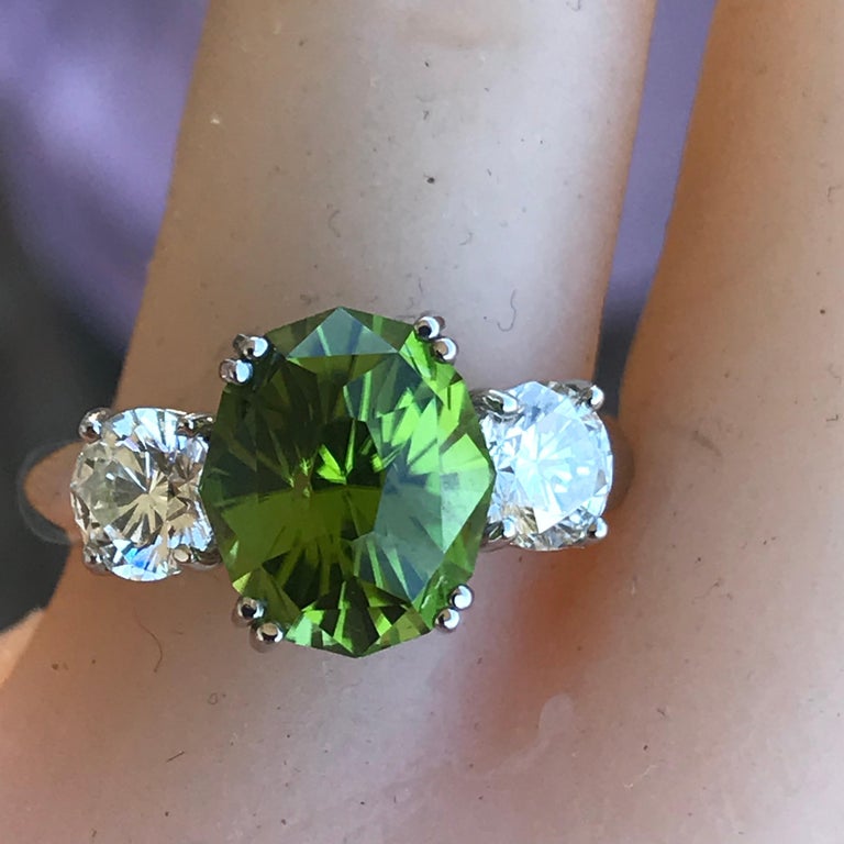 Peridot Engagement Ring, Set with Diamonds in 18 Karat Yellow Gold, 4.5
