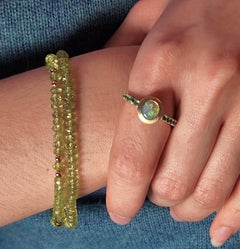 Peridot Faceted Bead Bracelet with 14K gold Swirl Clasp