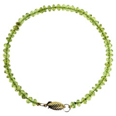 Peridot Faceted Bead Bracelet with 14K gold Swirl Clasp