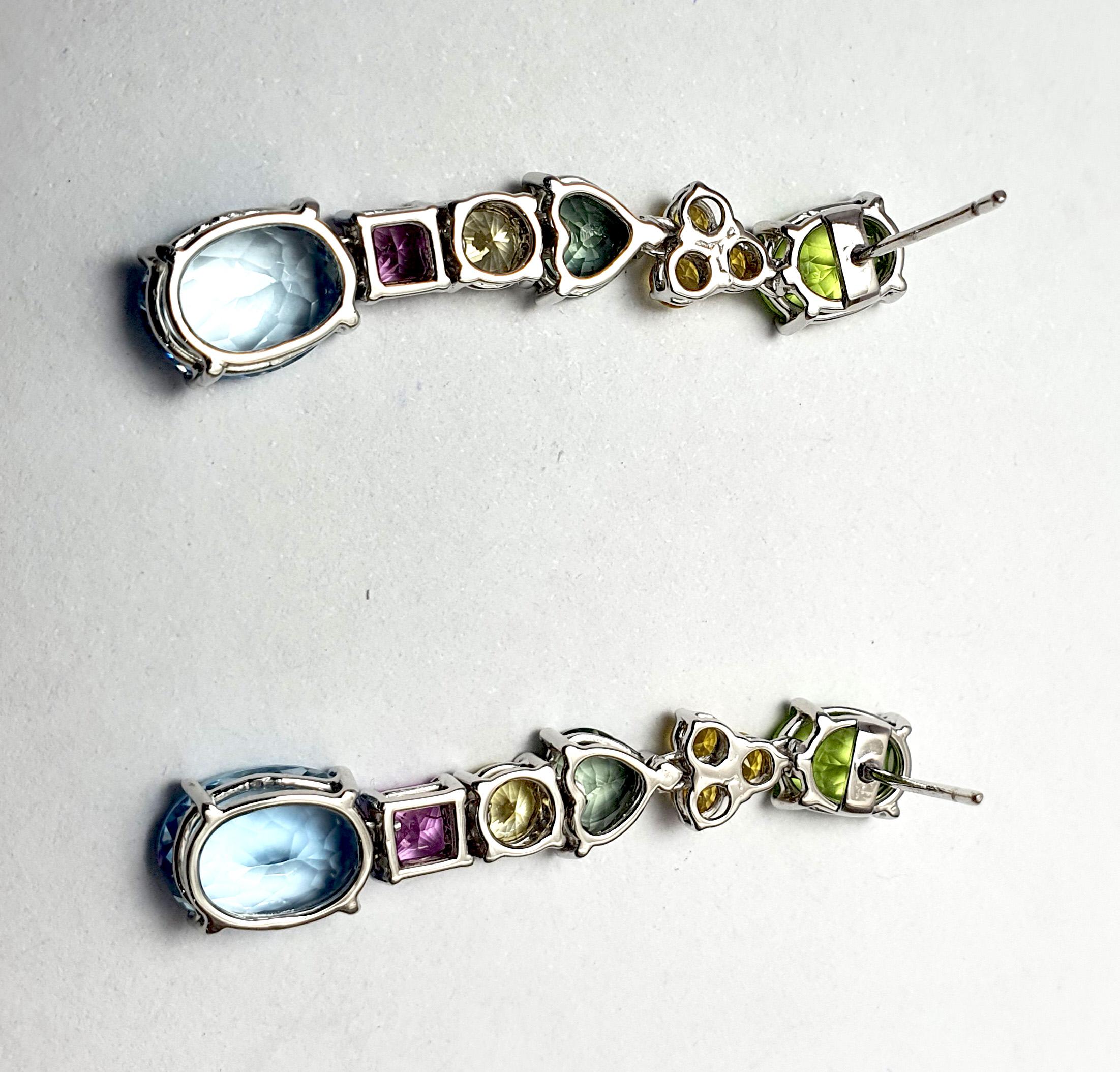 Women's Peridot, Fancy Sapphire and Aquamarine Earrings set in 18K White Gold Settings For Sale