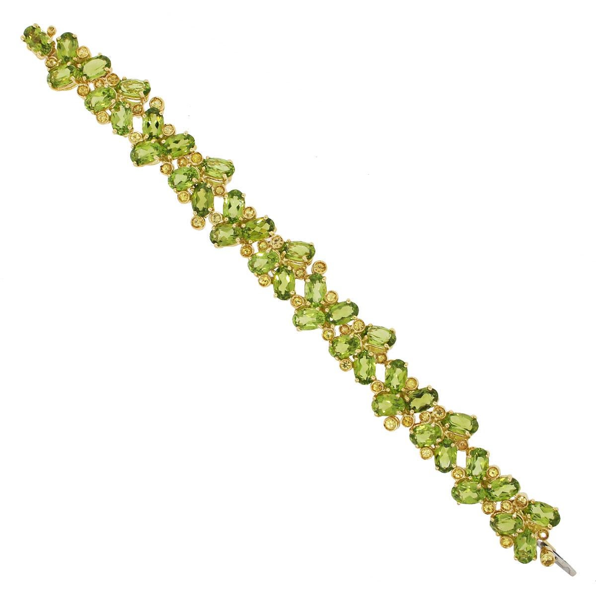 Material: 18k yellow gold
Gemstone Details: 37 peridot oval cut gemstones and 48 round cut peridot gemstones
Clasp: Tongue in box clasp with safety latch
Measurements: 6.5″ x 0.60″ x 0.28″
Total Weight: 46.2g
SKU: A30312229