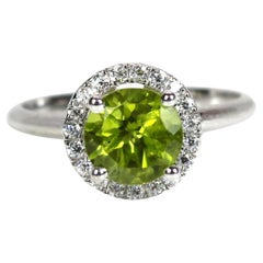 Anello a raggiera con gemma di peridoto naturale in argento sterling