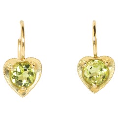 Peridot Heart-Shaped Earrings in 18K Yellow Gold by Bracken Jewelers