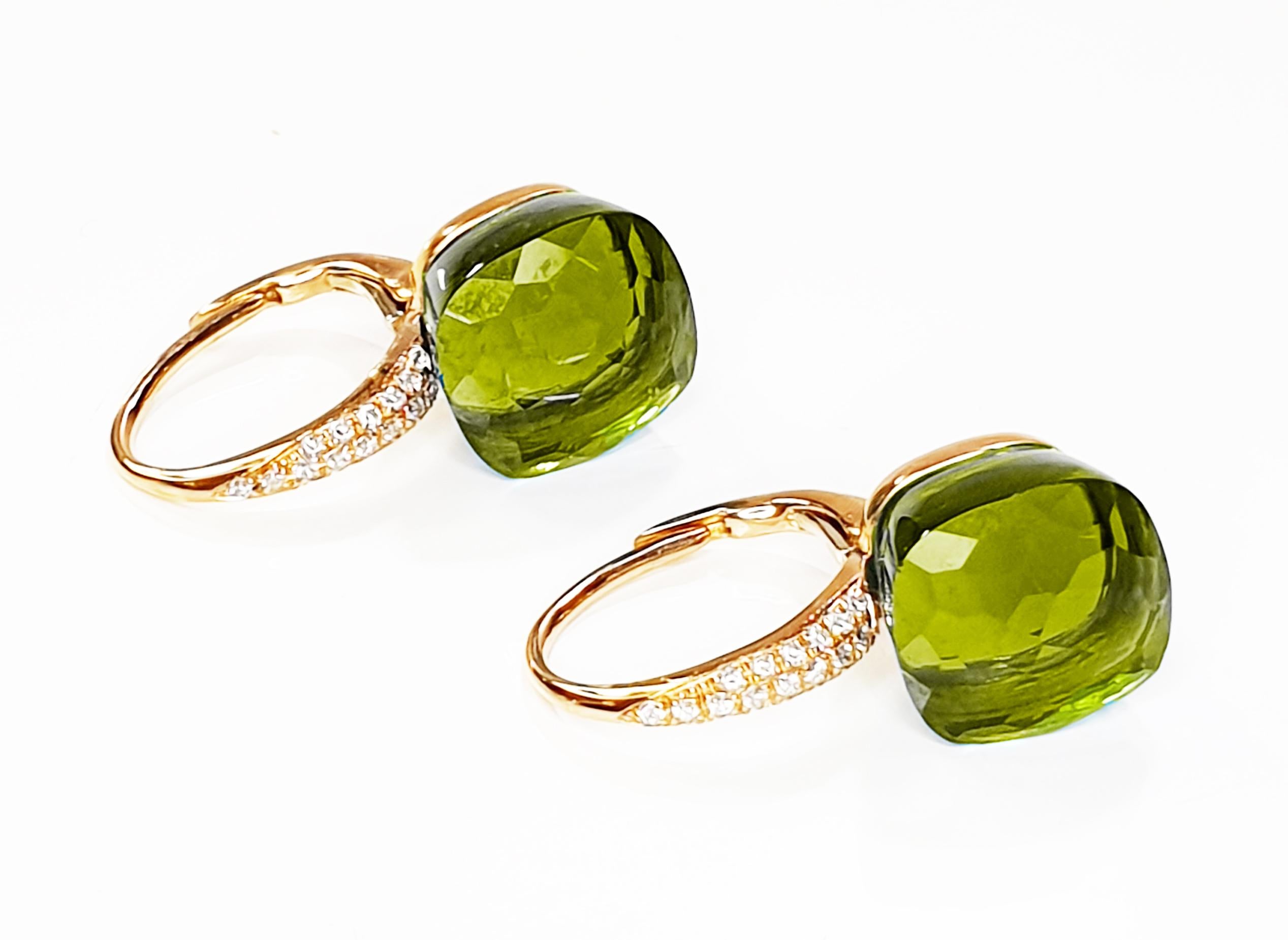 Orecchini pendenti in oro rosa 18 carati con peridoto sfaccettato e pavé di diamanti
Coppia di orecchini con peso totale in oro di 2,5gr e  di 56 diamanti per un totale di 0,21ct
I topazi hanno un peso di 4,00ct ciascuno e misurano 9 mm o 0,35