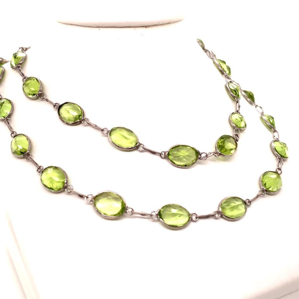 This elegant necklace is made of a single strand of 20 inches of alluring peridots set in 18K white gold. The unique green of the peridot is what makes this necklace so captivating. The peridot, also known as the stardust gem, is one that never