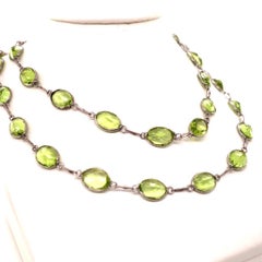 Peridot Necklace in Spectacle Setting in 18K White Gold