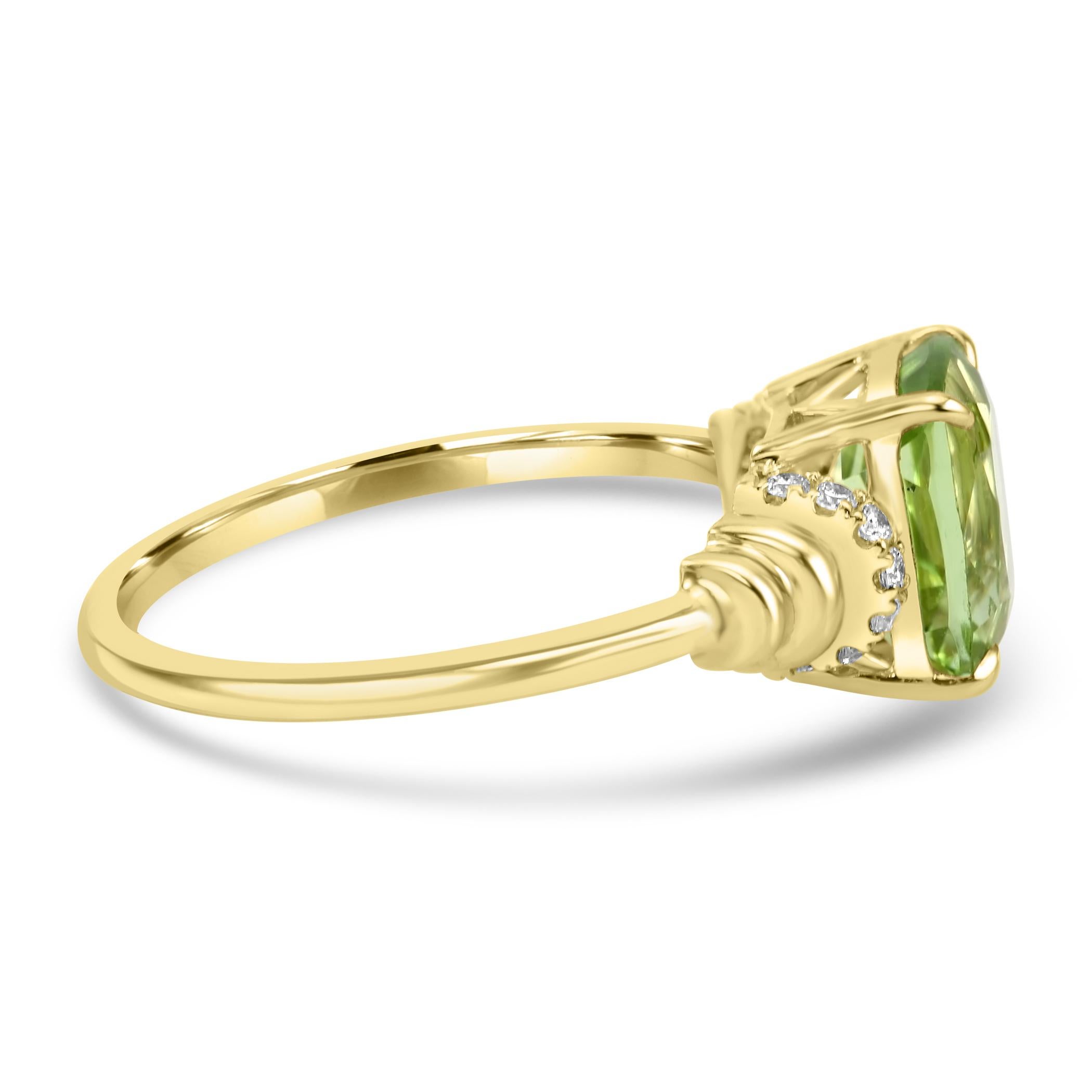 The centerpiece of this ring is a captivating Green Peridot, boasting a generous 2.42 carats. This vivid gemstone, with its fresh and lively green hue, becomes the focal point of a design that exudes sophistication and charm. 

On either side of the